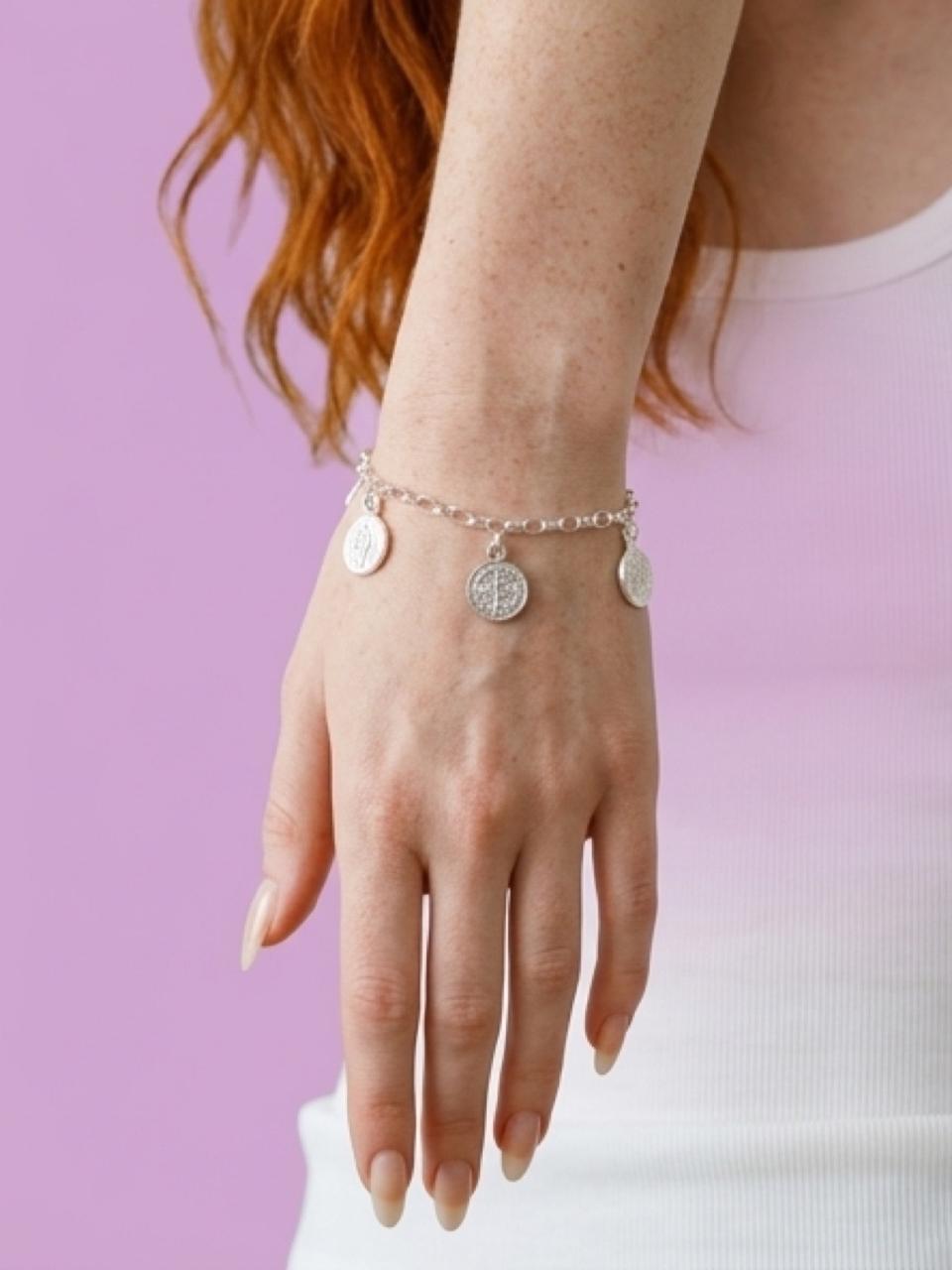 Silver bracelet with charms