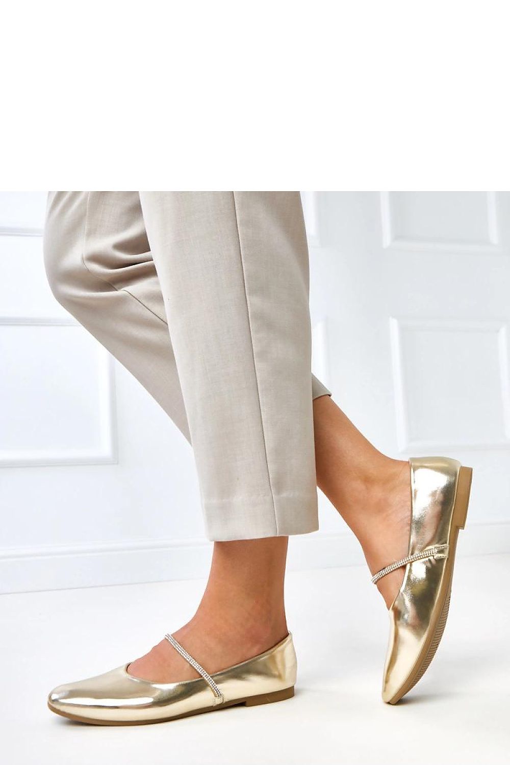 Sapatilha dourada feminina