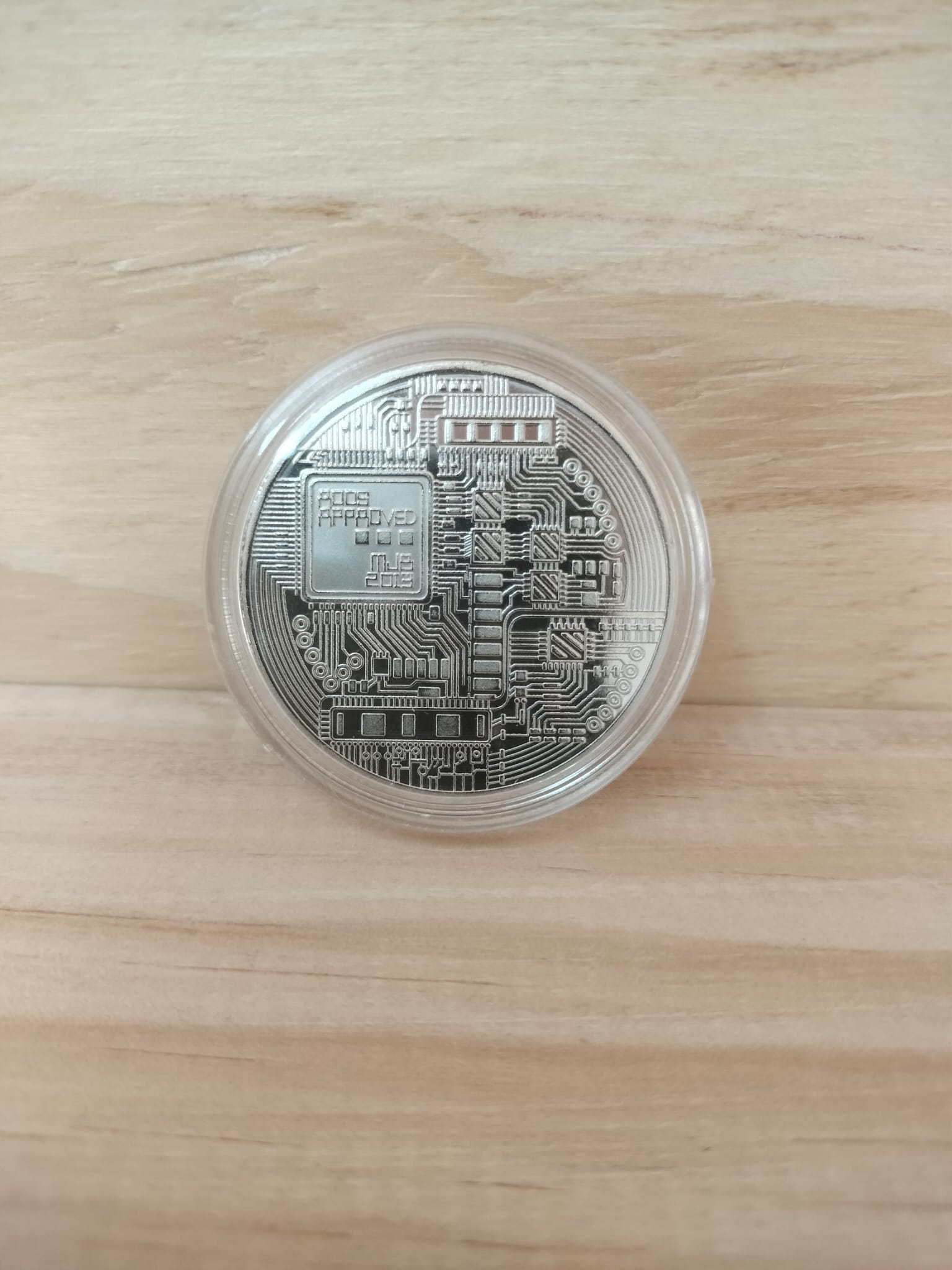 Moneda plateada de Bitcoin