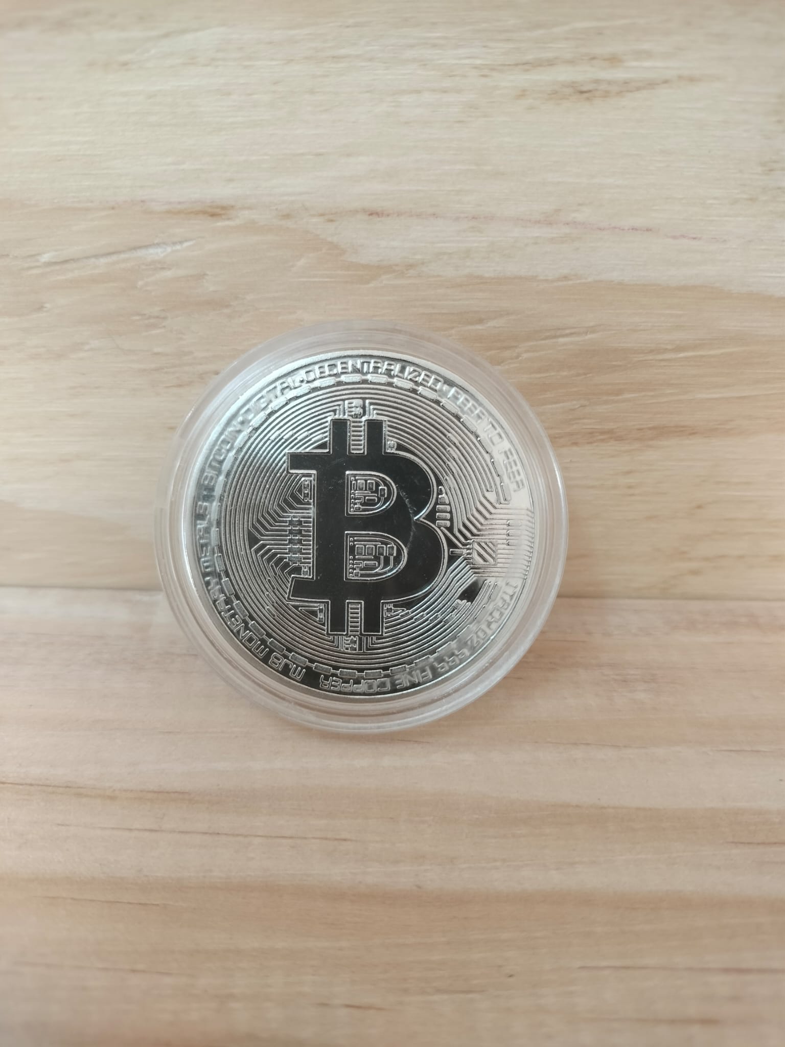 Moneda plateada de Bitcoin