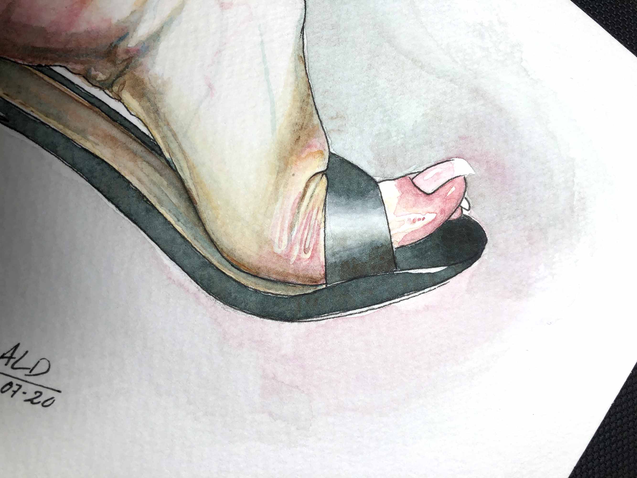 Wet foot in a sandal