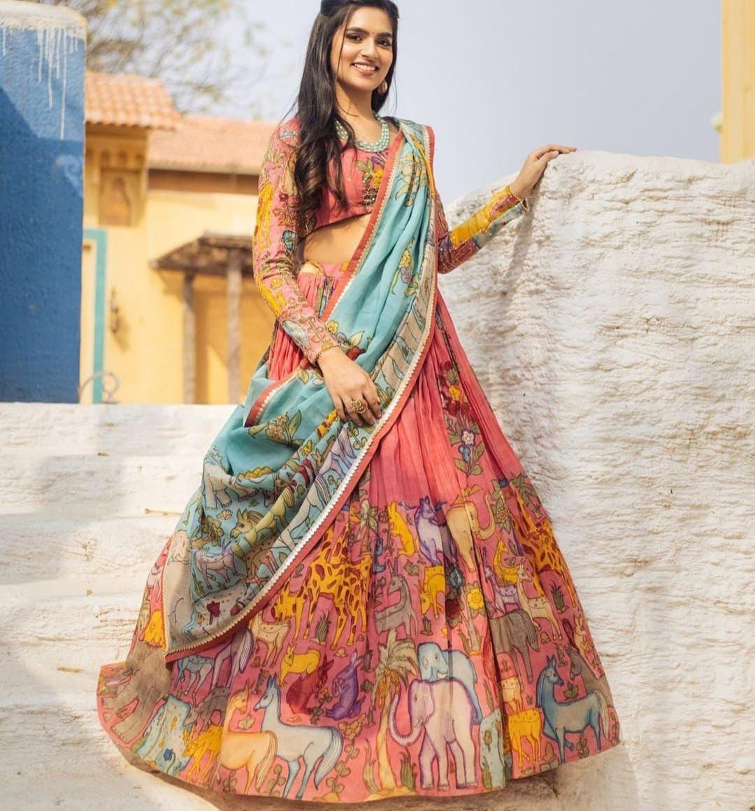 Royal Rajasthani print with cyan dupatta