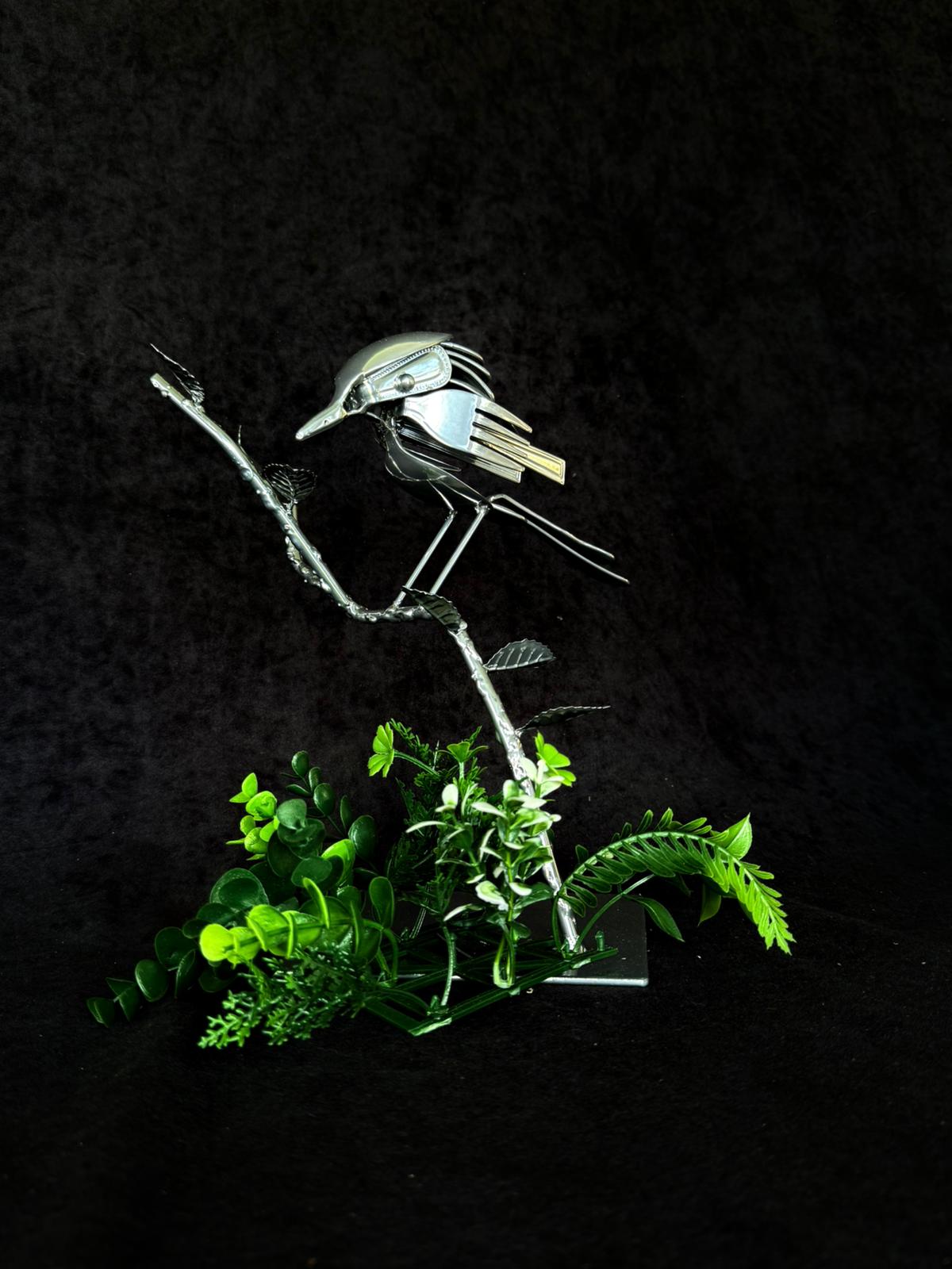 Metal Bird Sculpture on Branch