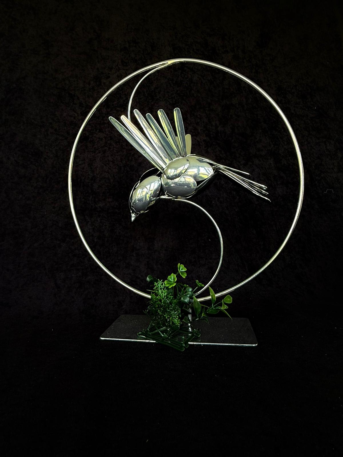 Metal Bird Sculpture in Small Circle