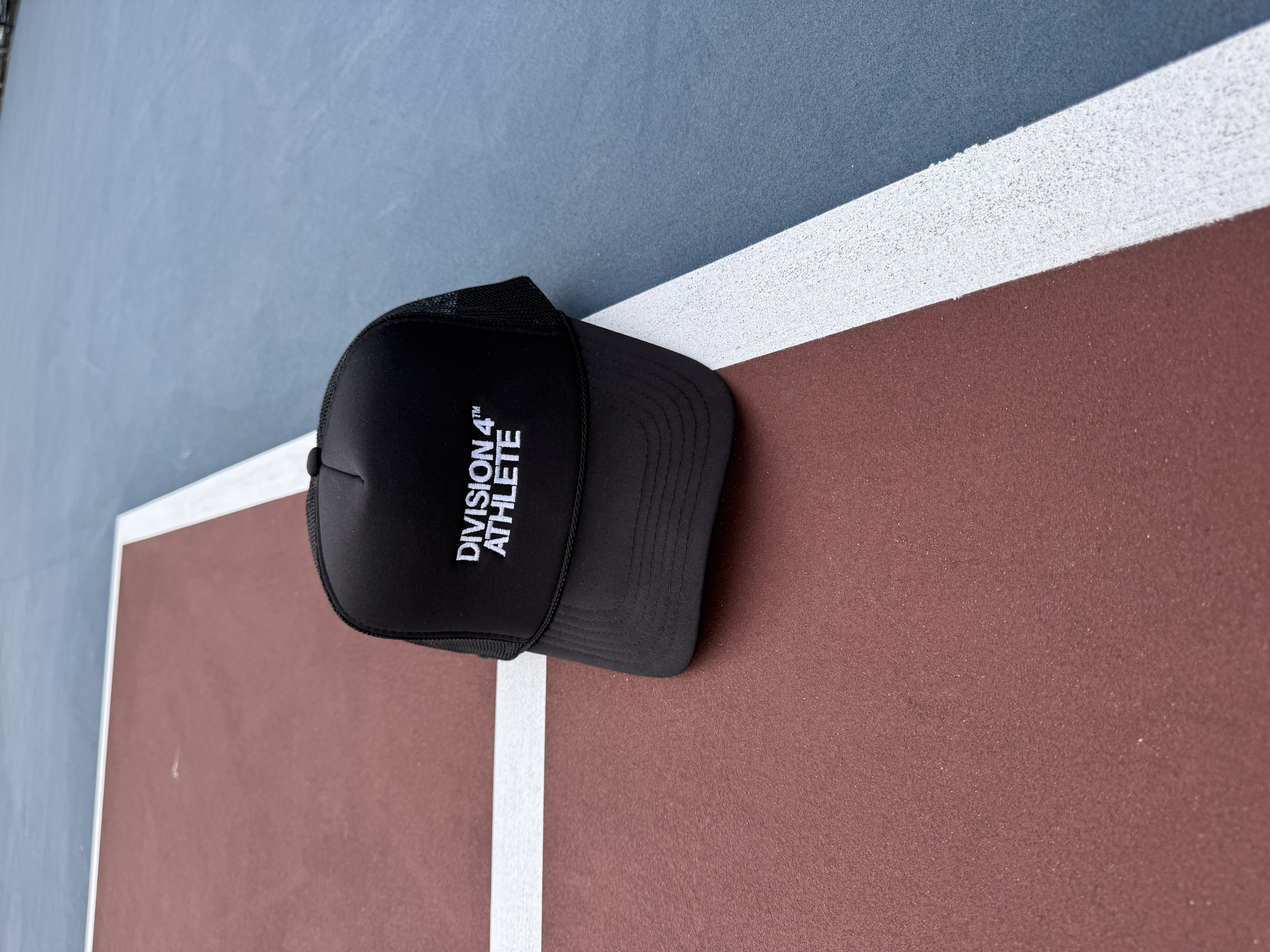 Division 4 Athlete Trucker Hat