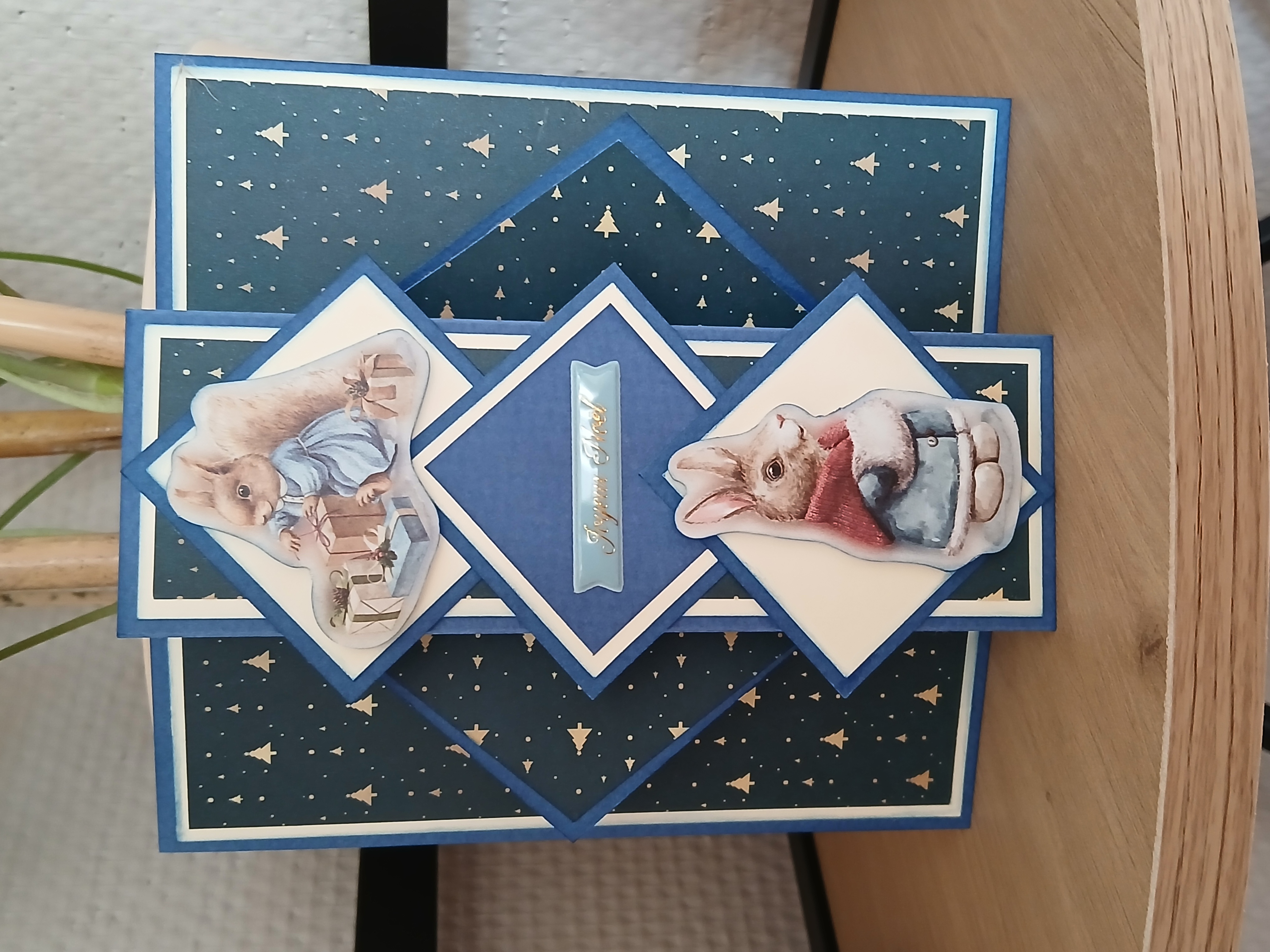 Carte : Le Noël de la famille lapin