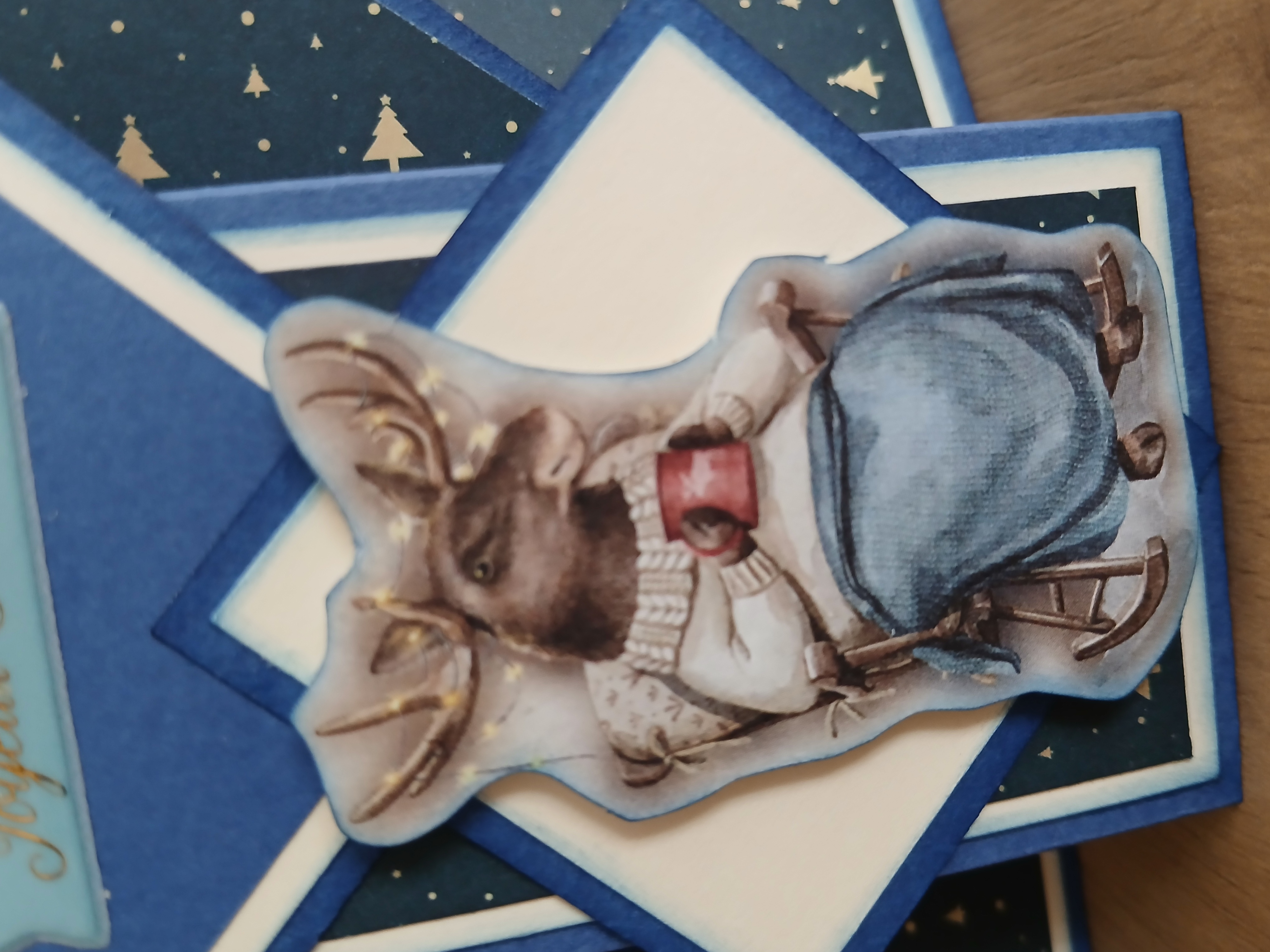 Carte : La famille cerf au chaud dans sa maison