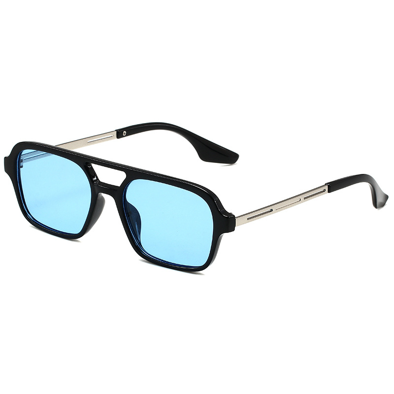 LENTES Montura negra pata plateada lente azul