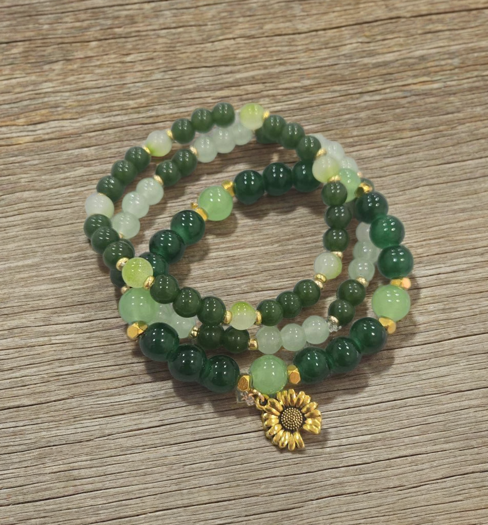 Green Beaded Bracelet with Sunflower Charm