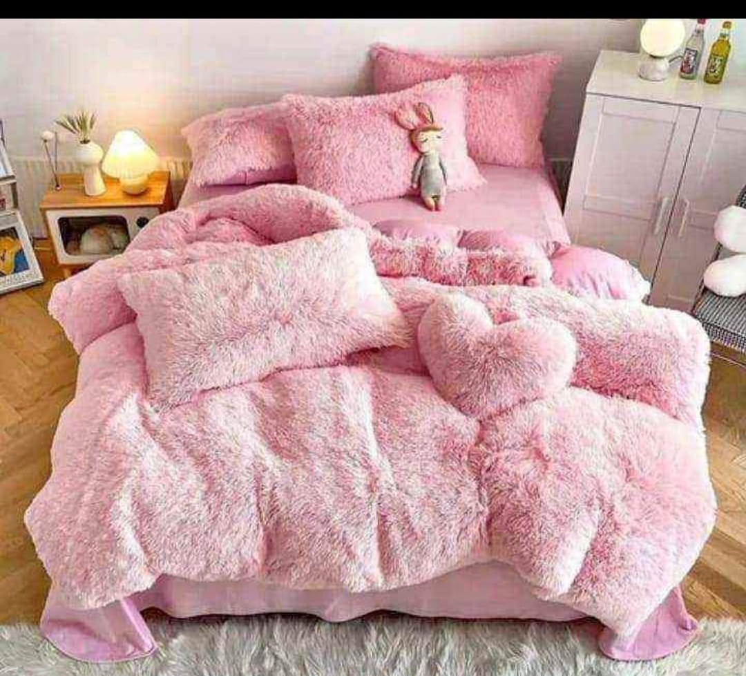 Edredón rosa esponjoso