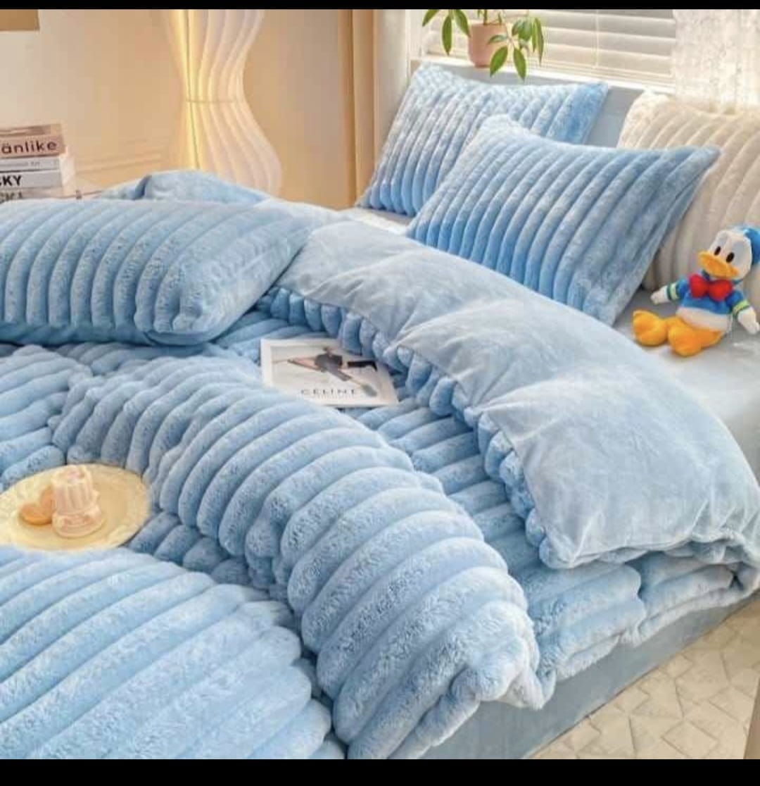 Juego de sábanas acolchadas azul claro