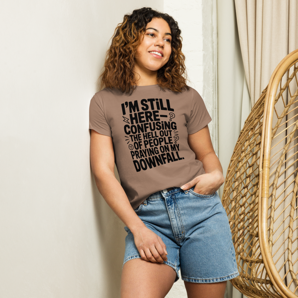 I’m still here—confusing the hell out of people praying on my downfall Statement Graphic Tee