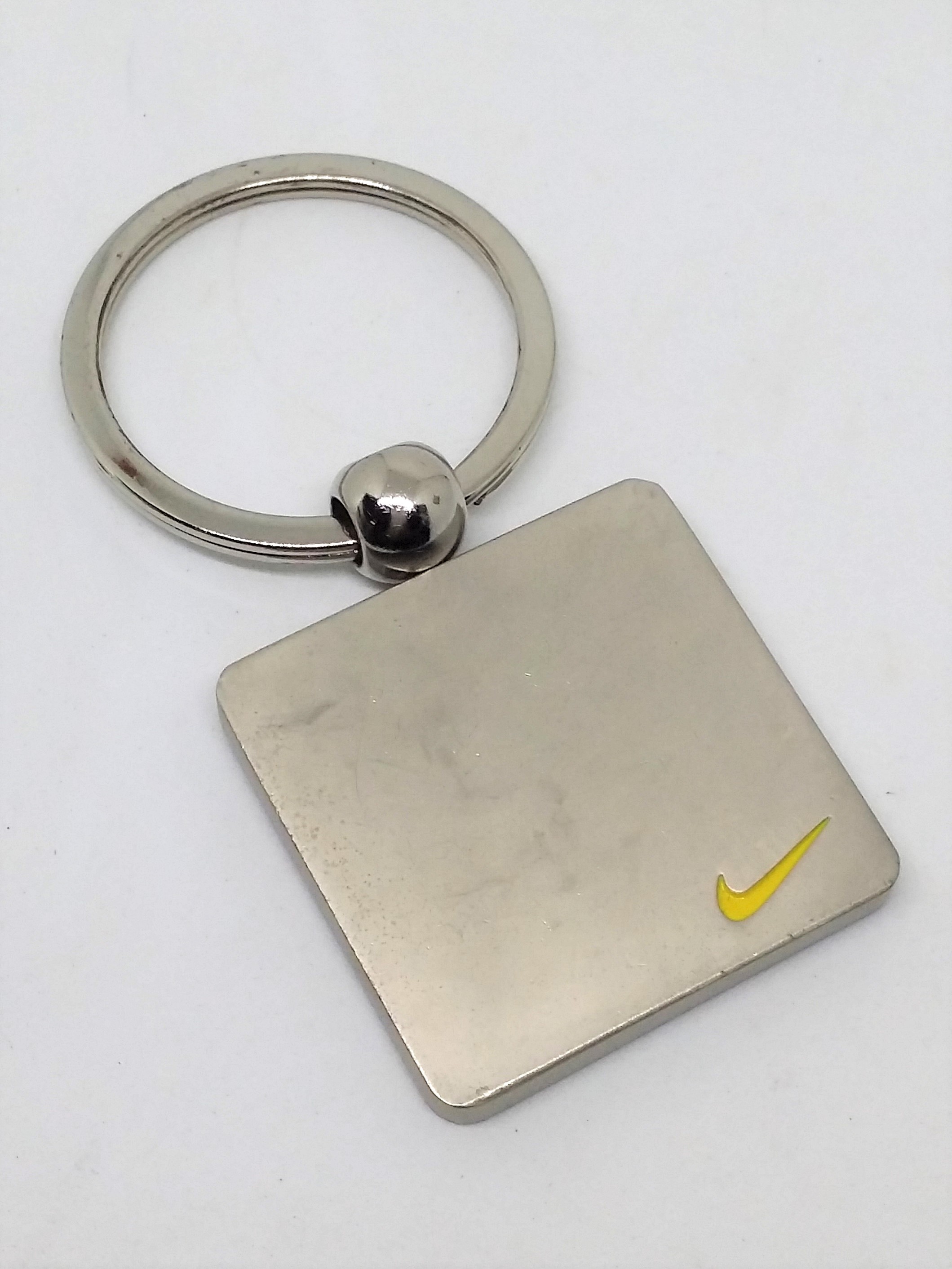 Vintage Nike Double Sided Swoosh Silver Metal Keychain