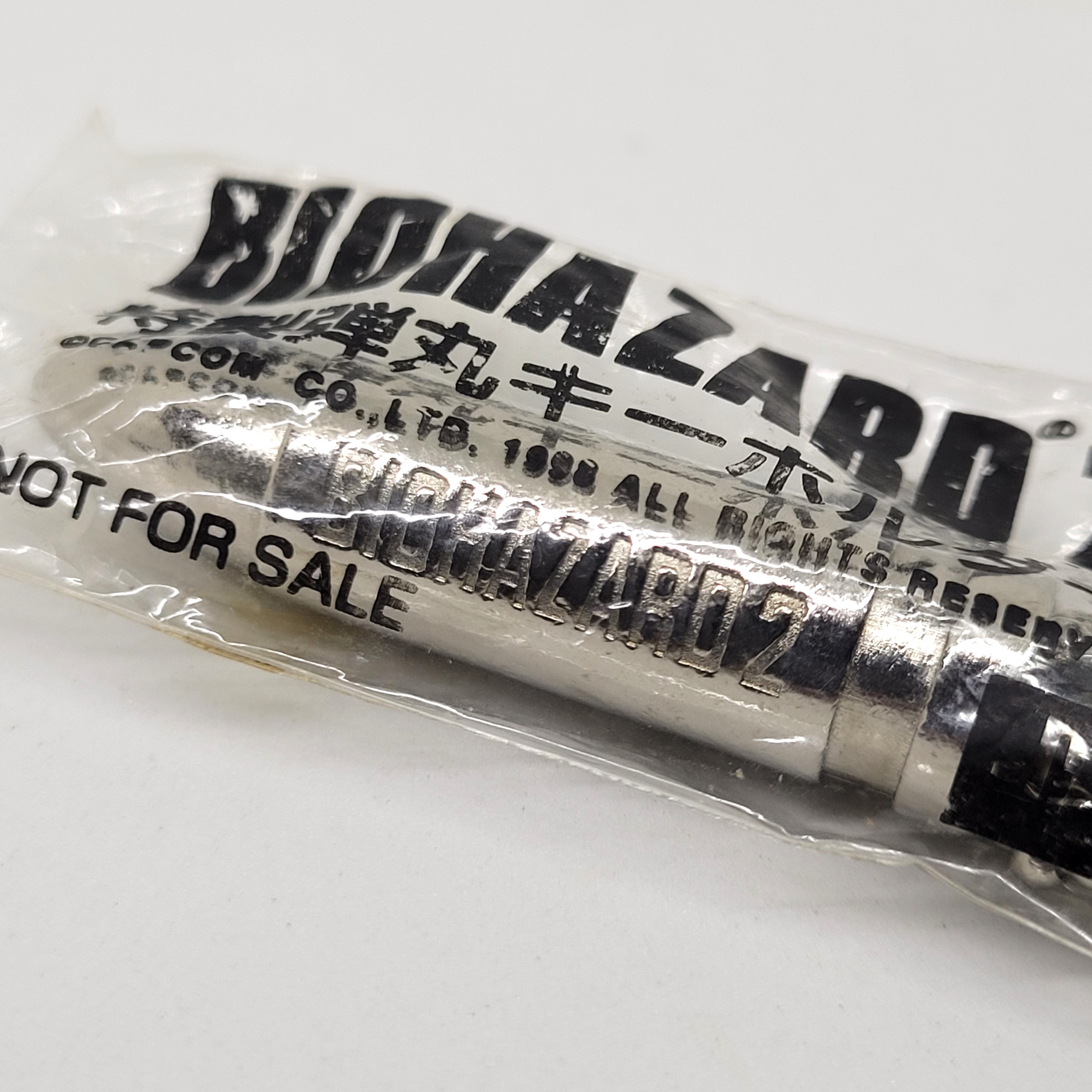 Biohazard 2 Bullet Keychain - 1998 Japan Sony Playstation Resident Evil NFS