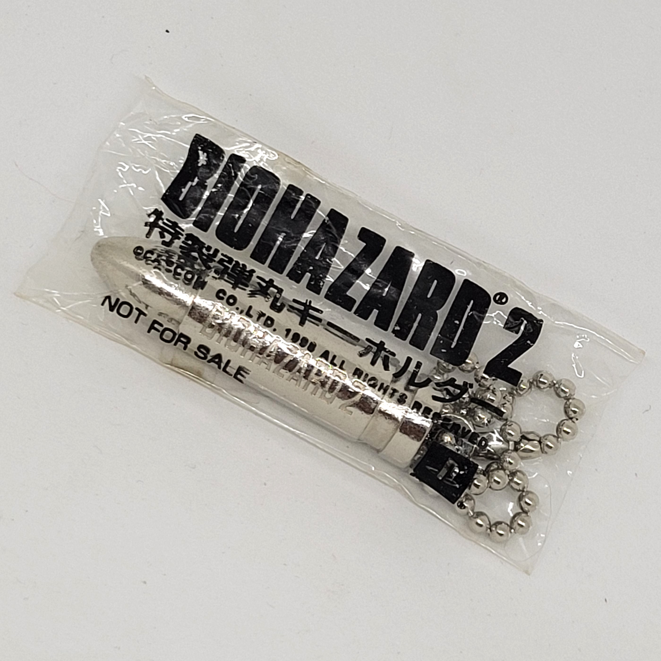 Biohazard 2 Bullet Keychain - 1998 Japan Sony Playstation Resident Evil NFS