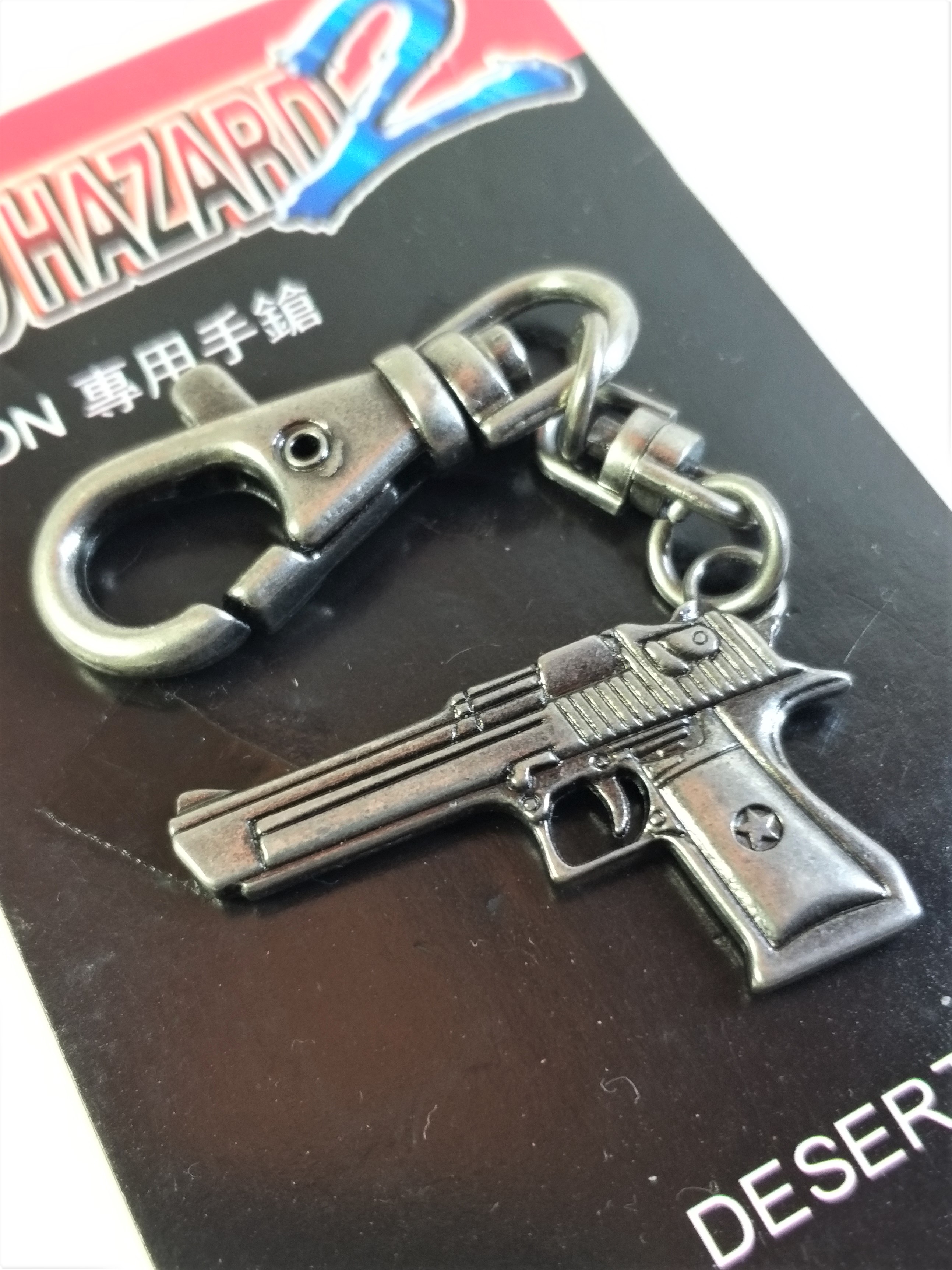 BIOHAZARD 2 Leon Desert Eagle Keychains (Silver / Bronze) - 1998 Capcom Resident Evil Hong Kong Comics