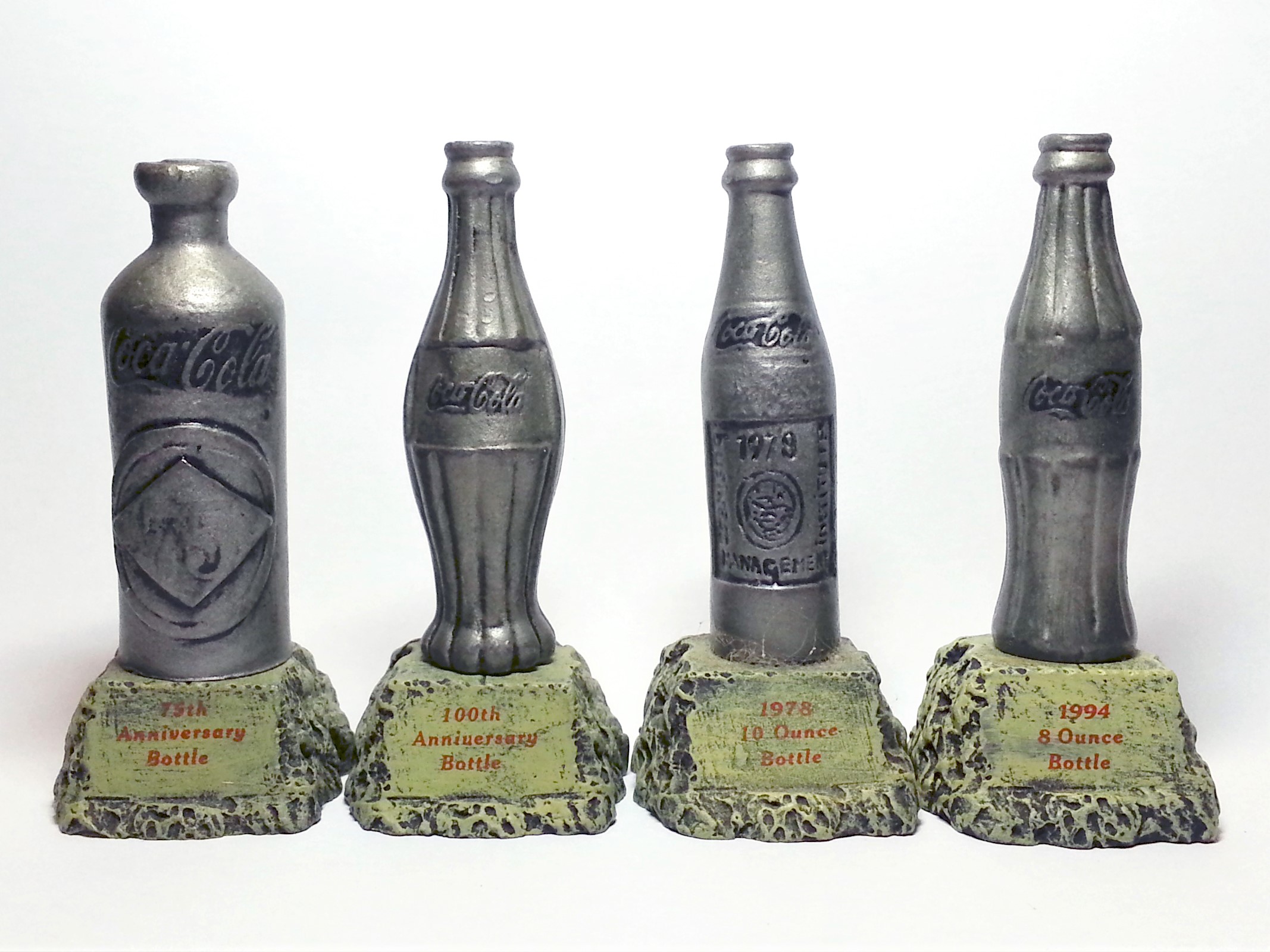 Coca Cola 2000 Faux Aged Pewter Miniature Contour Bottle Statues Set of 4