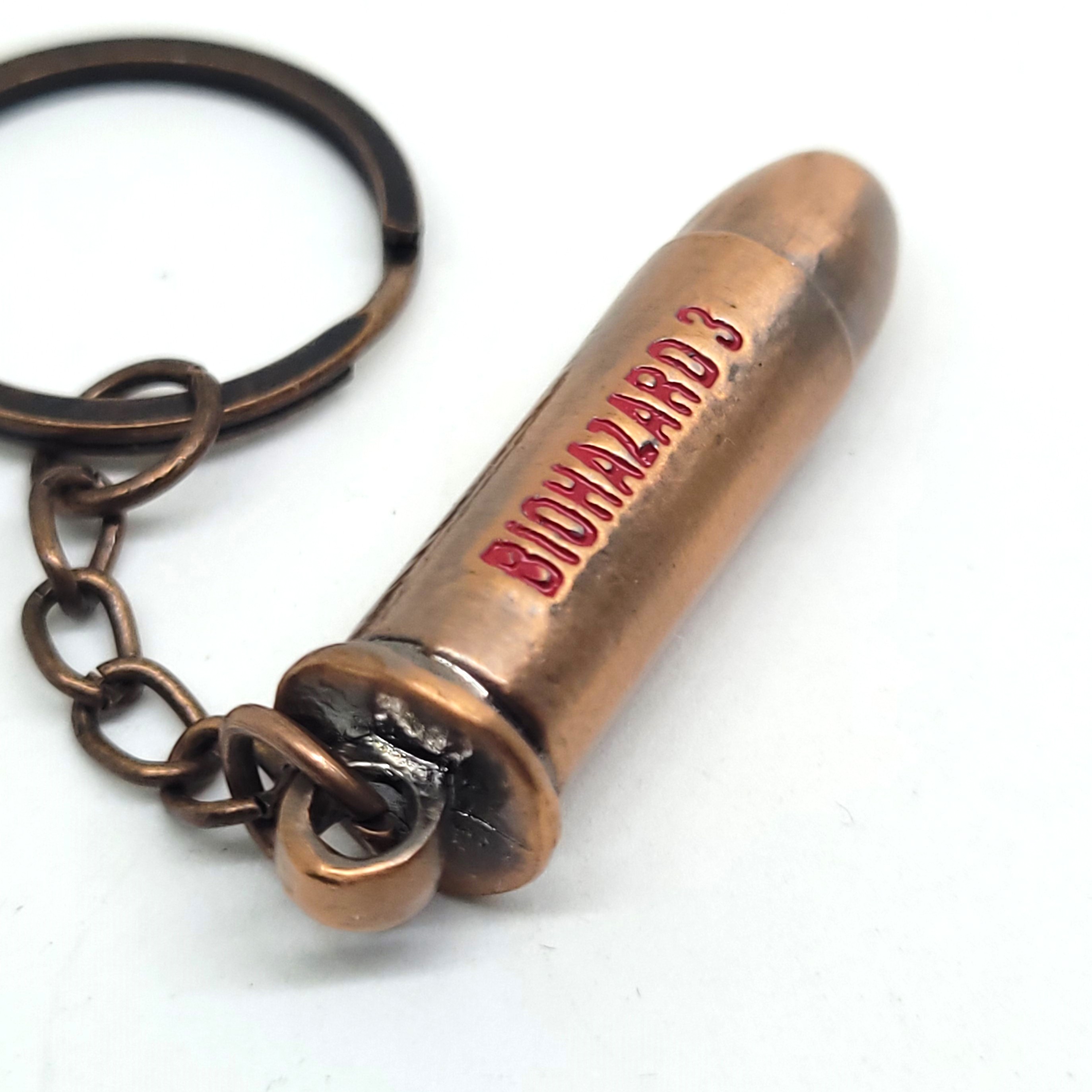 BIOHAZARD 3 Magnum Bullet Keychains (Silver / Copper) - 1999 Capcom Resident Evil Hong Kong Comics