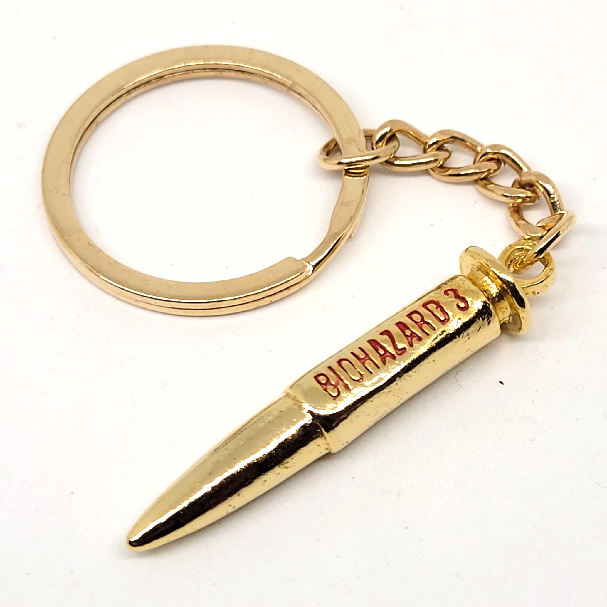 BIOHAZARD 3 MAC-11 Bullet Keychain (Gold) - 1999 Capcom Resident Evil Hong Kong Comics