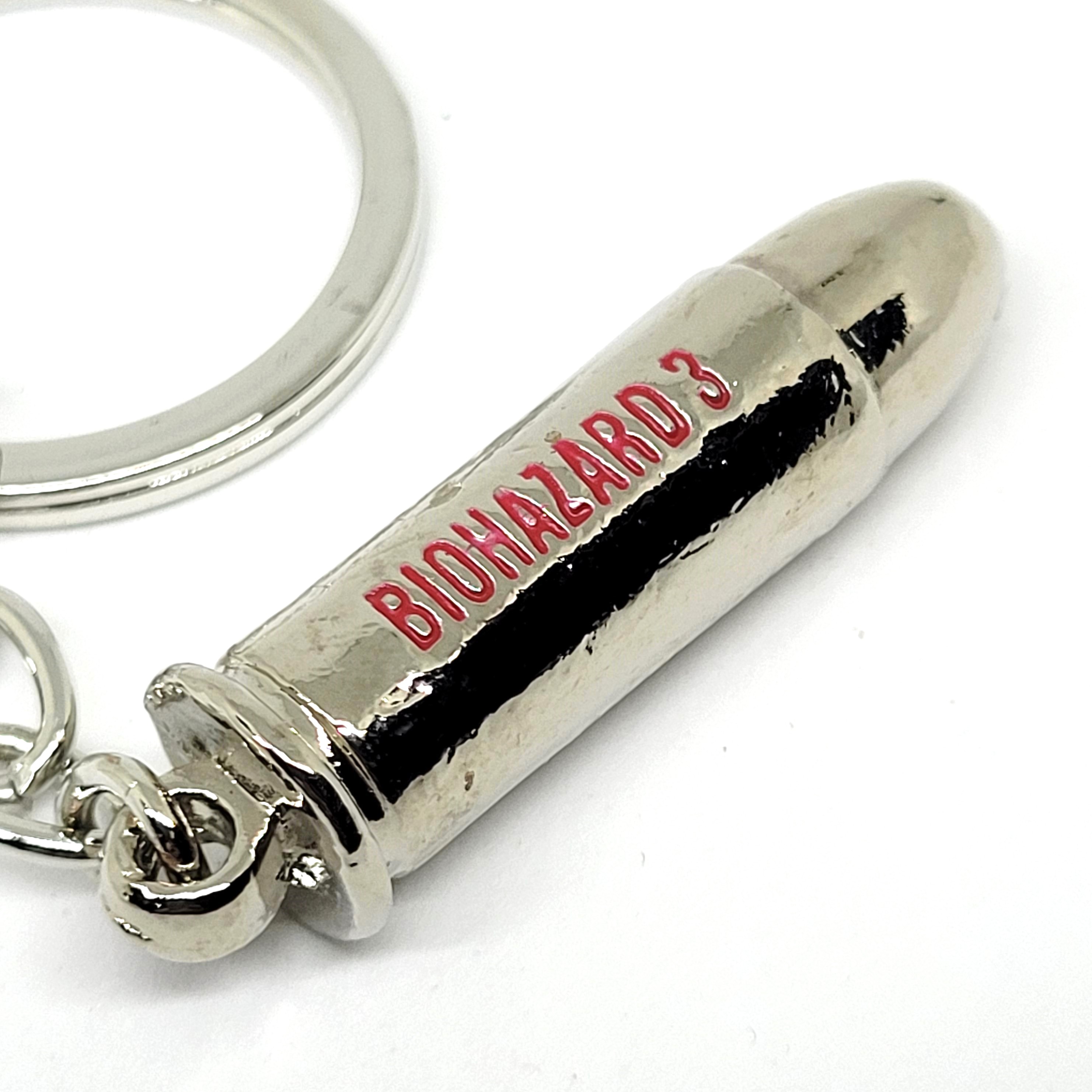 BIOHAZARD 3 Magnum Bullet Keychains (Silver / Copper) - 1999 Capcom Resident Evil Hong Kong Comics