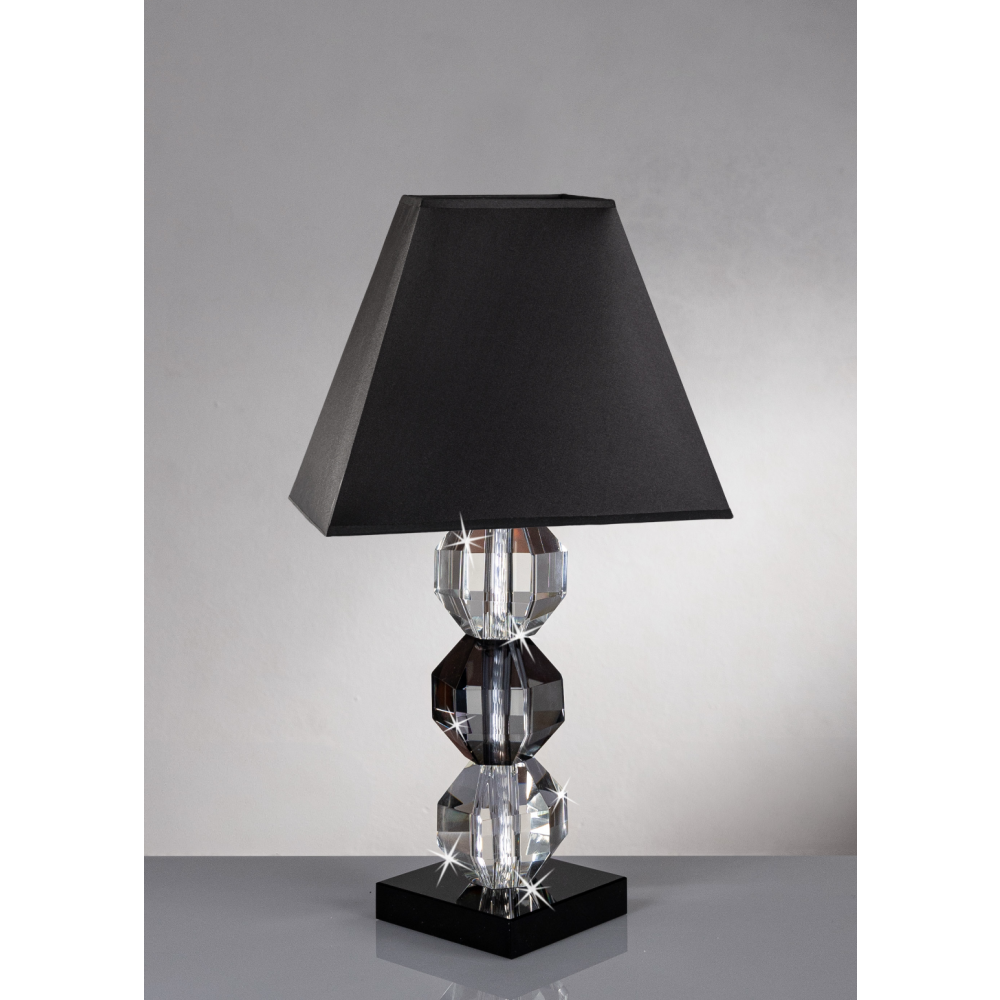 Lume in cristallo trasparente con particolare centrale colore nero