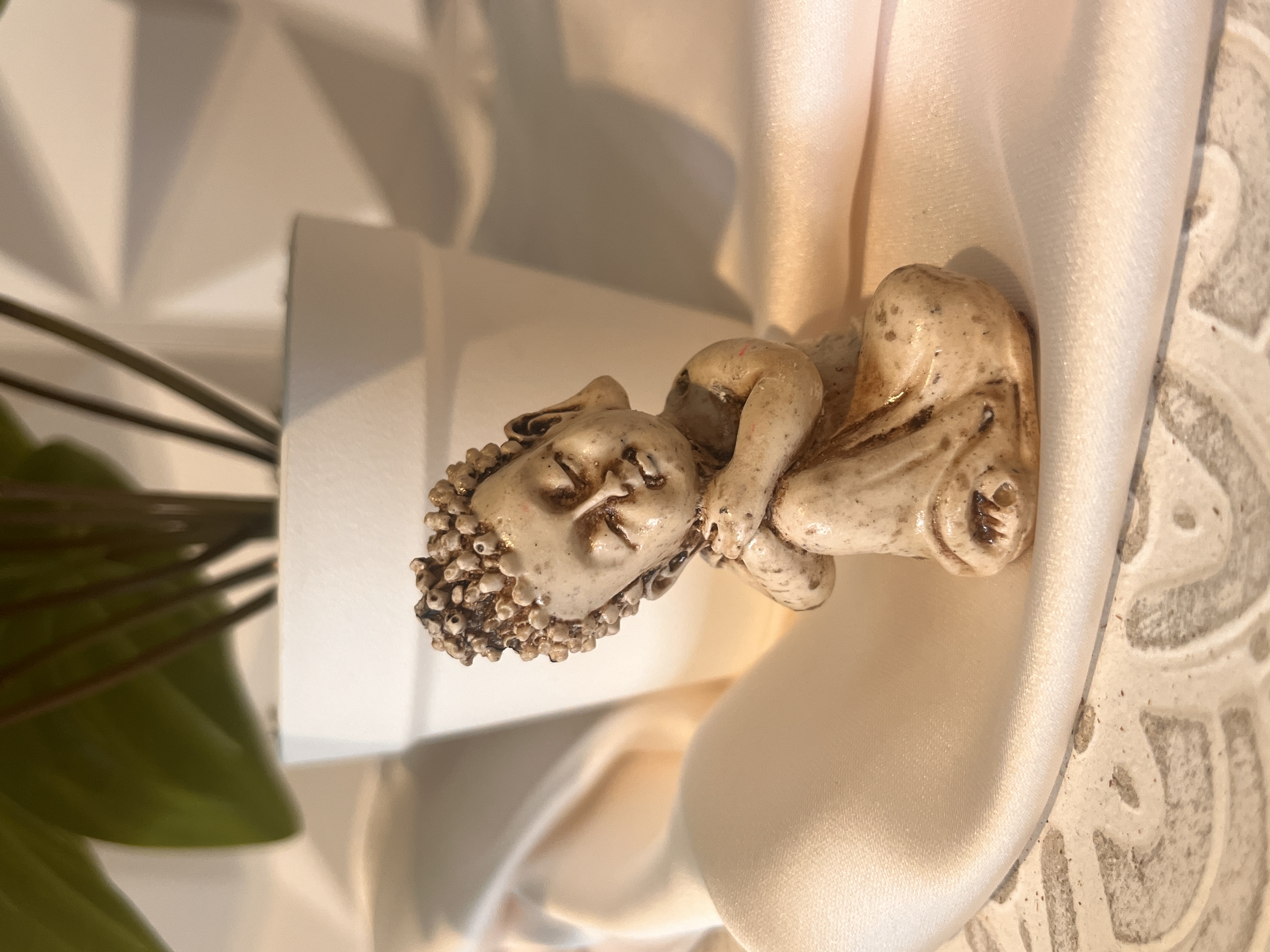 Resting Buddha Figurine