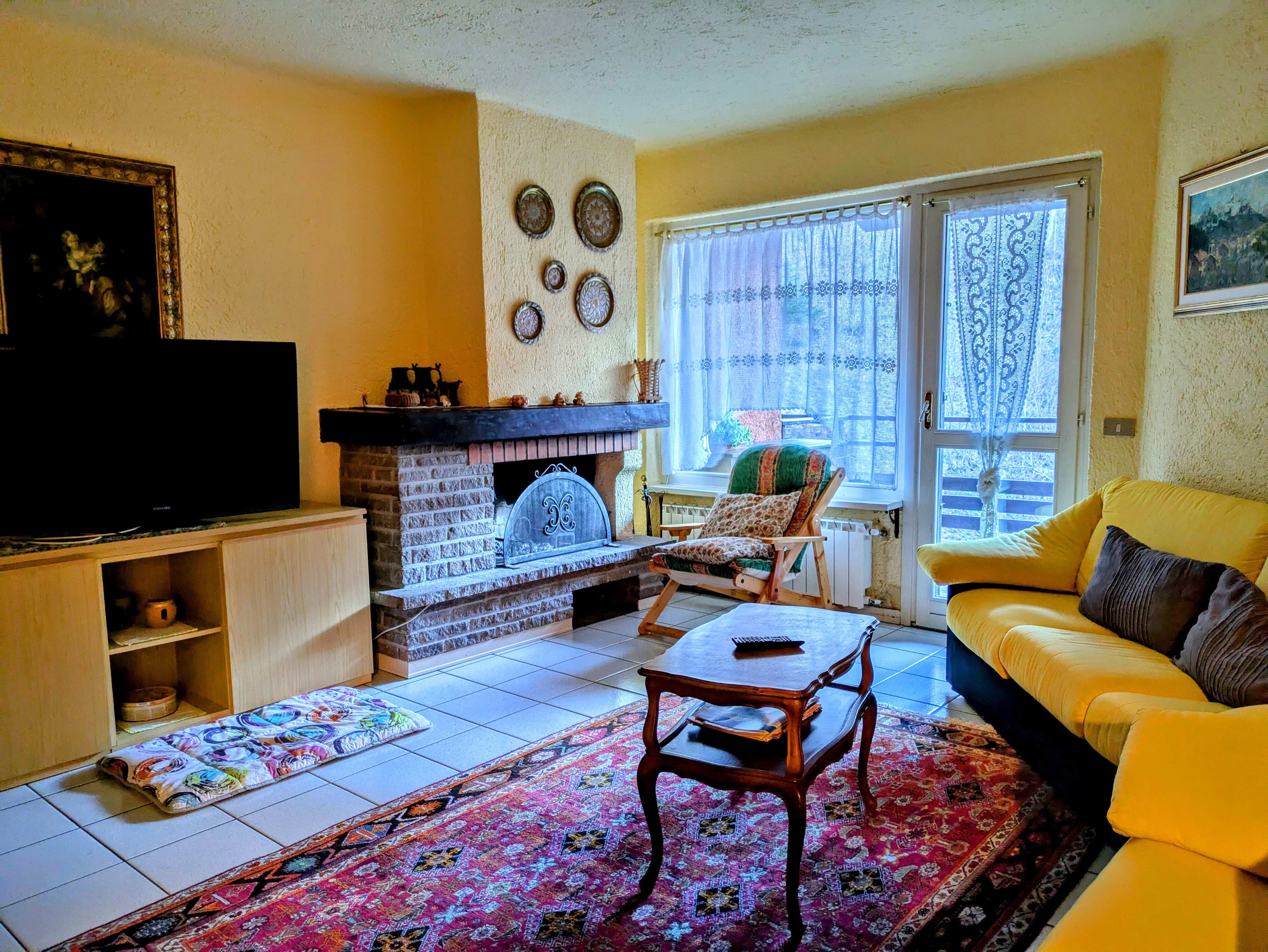 Trilocale con terrazzo e box auto