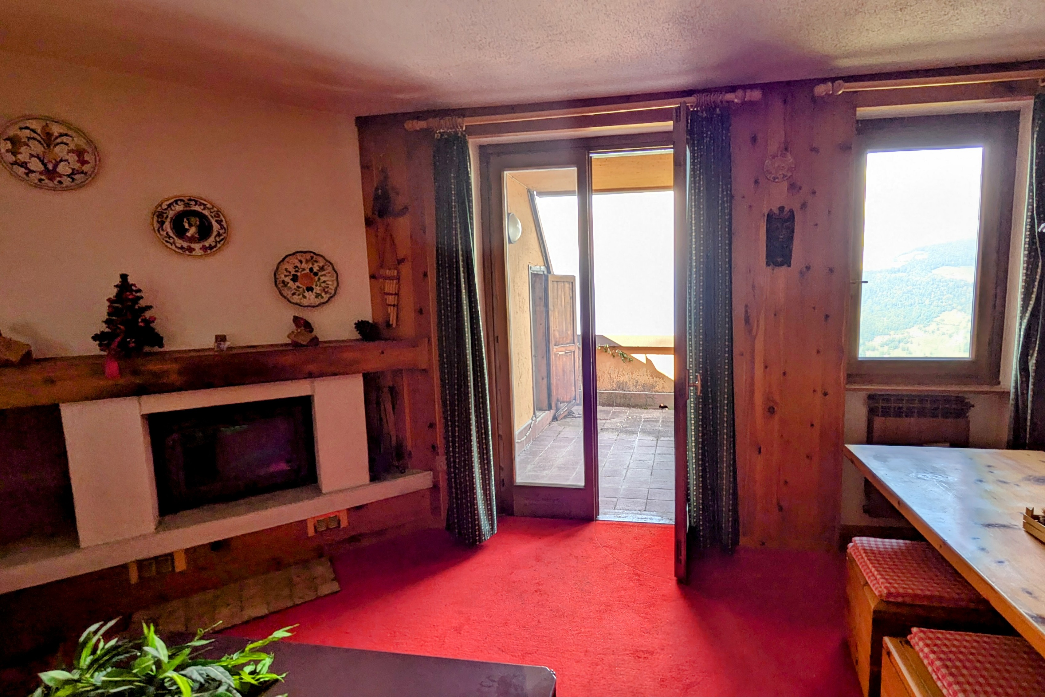 Bilocale con terrazzo panoramico a valle