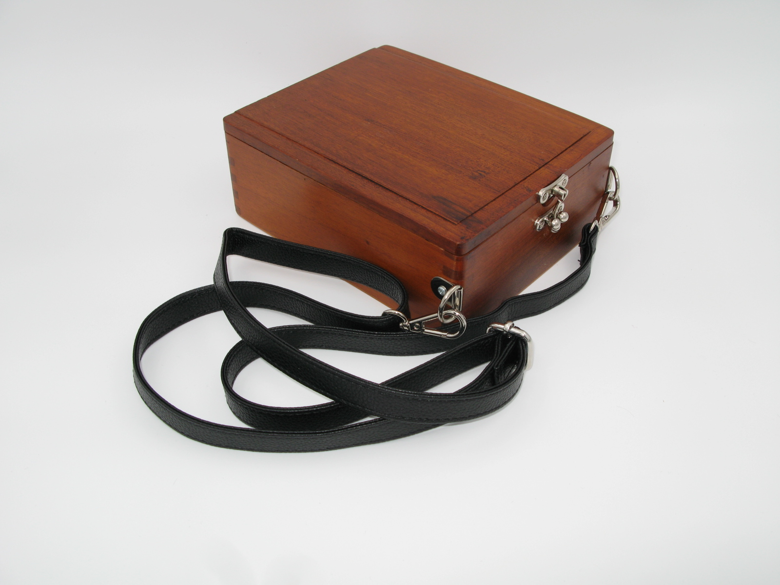 Wooden box with shoulder strap
