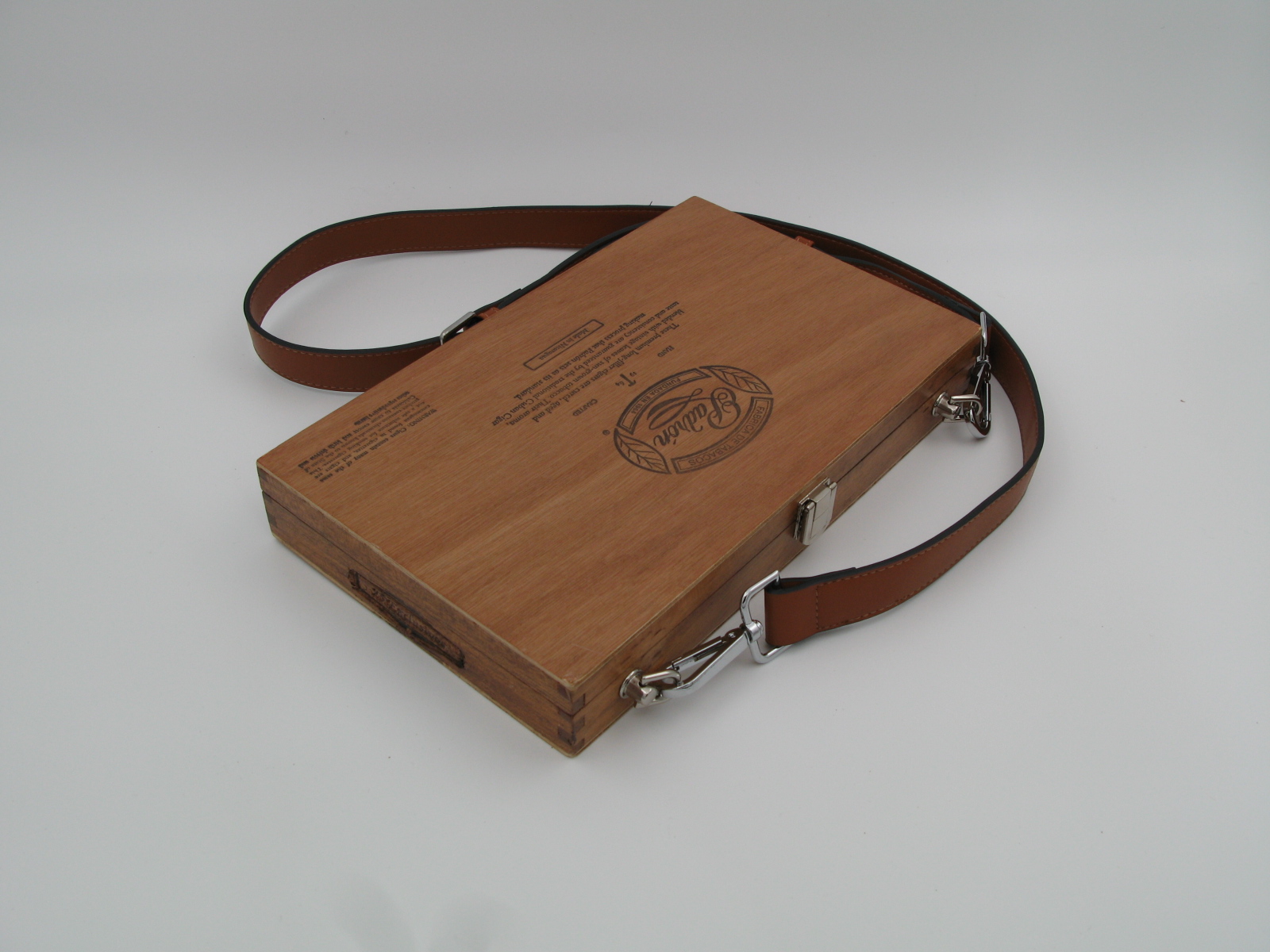 Wooden cigar boxwith leather strap