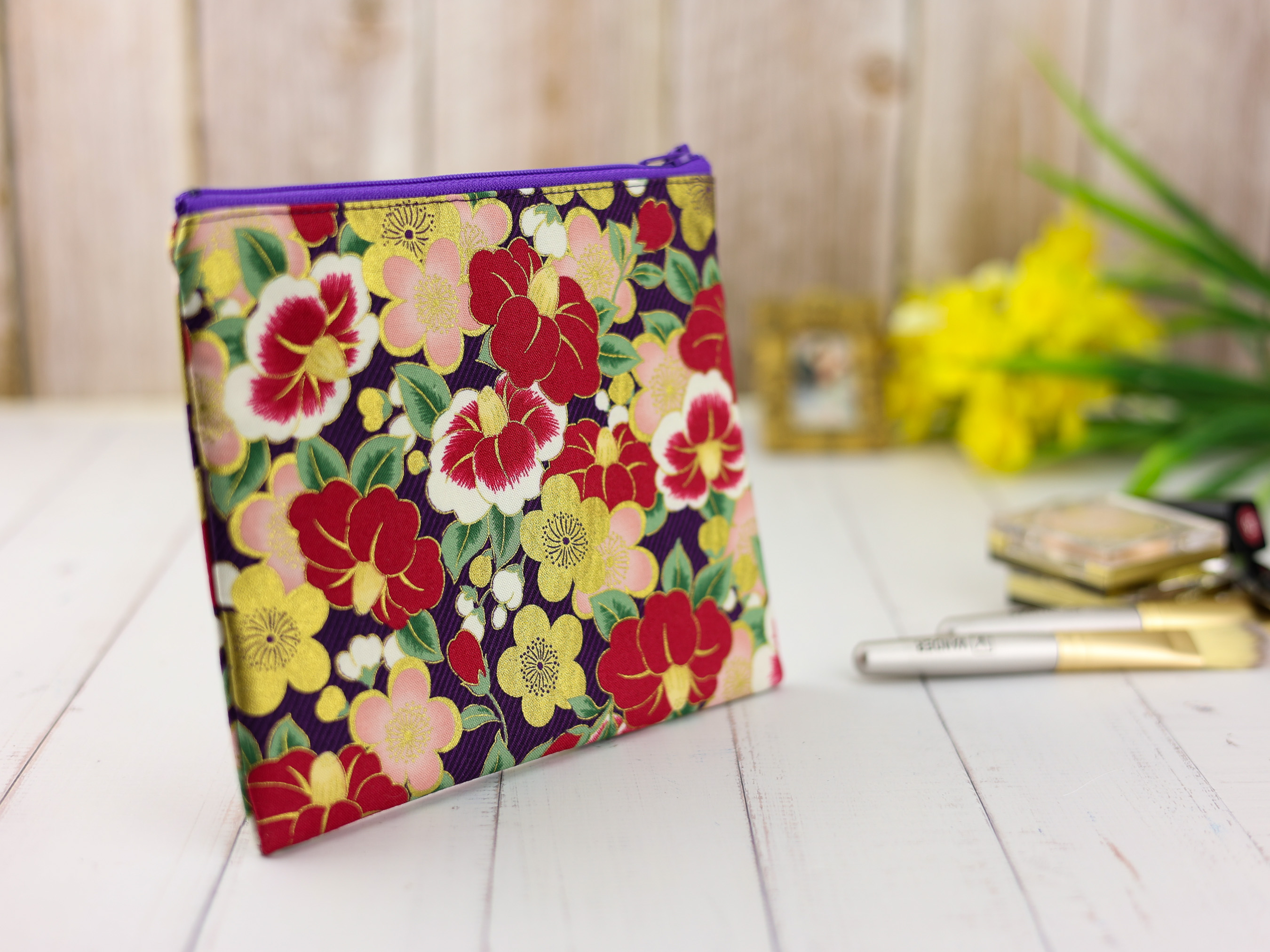 Purple Camellia Pouch – Japanese Zipper Bag with Red and Gold Tsubaki Flowers on Dark Background