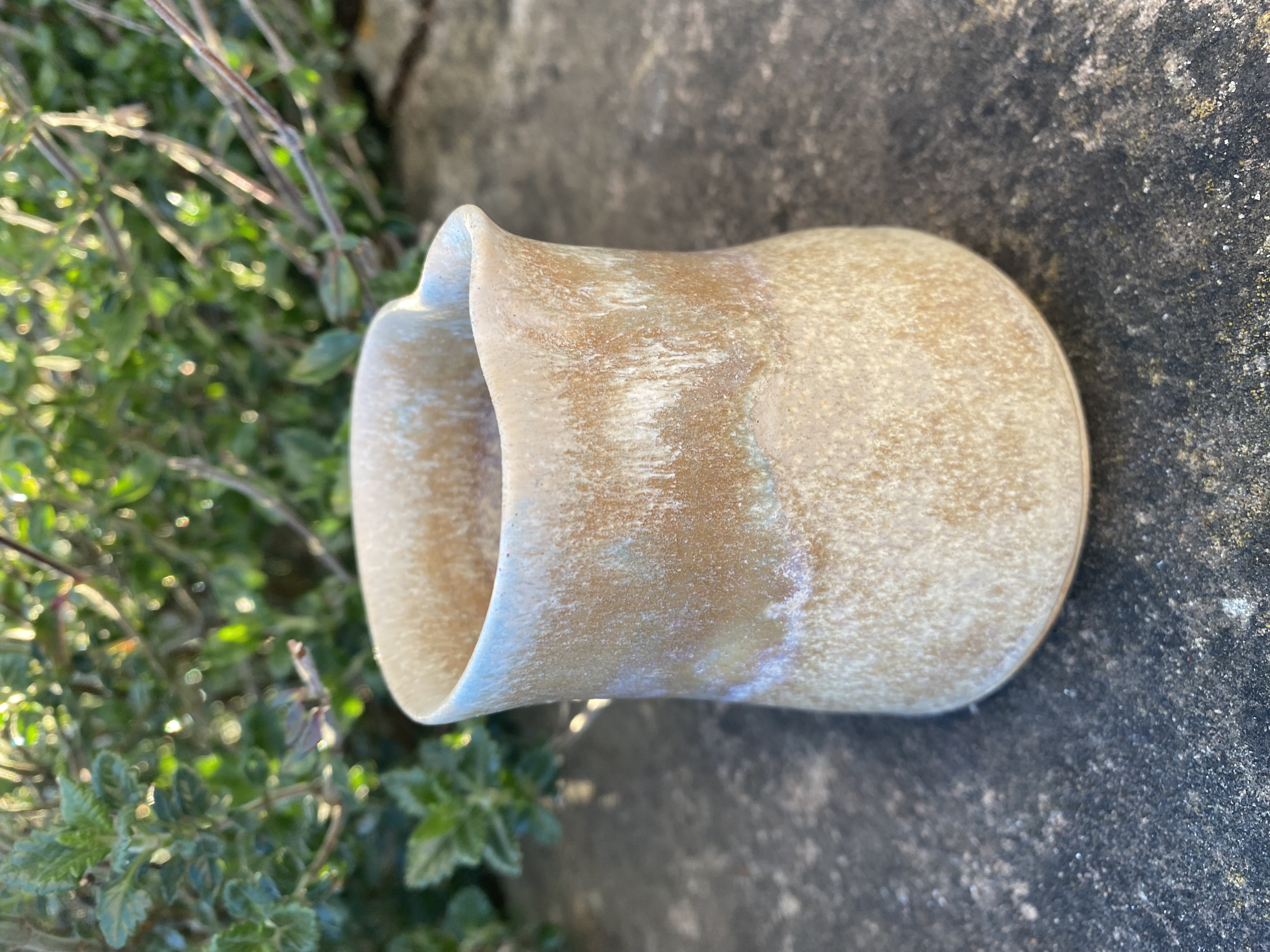 Handmade ceramic jug and saucer