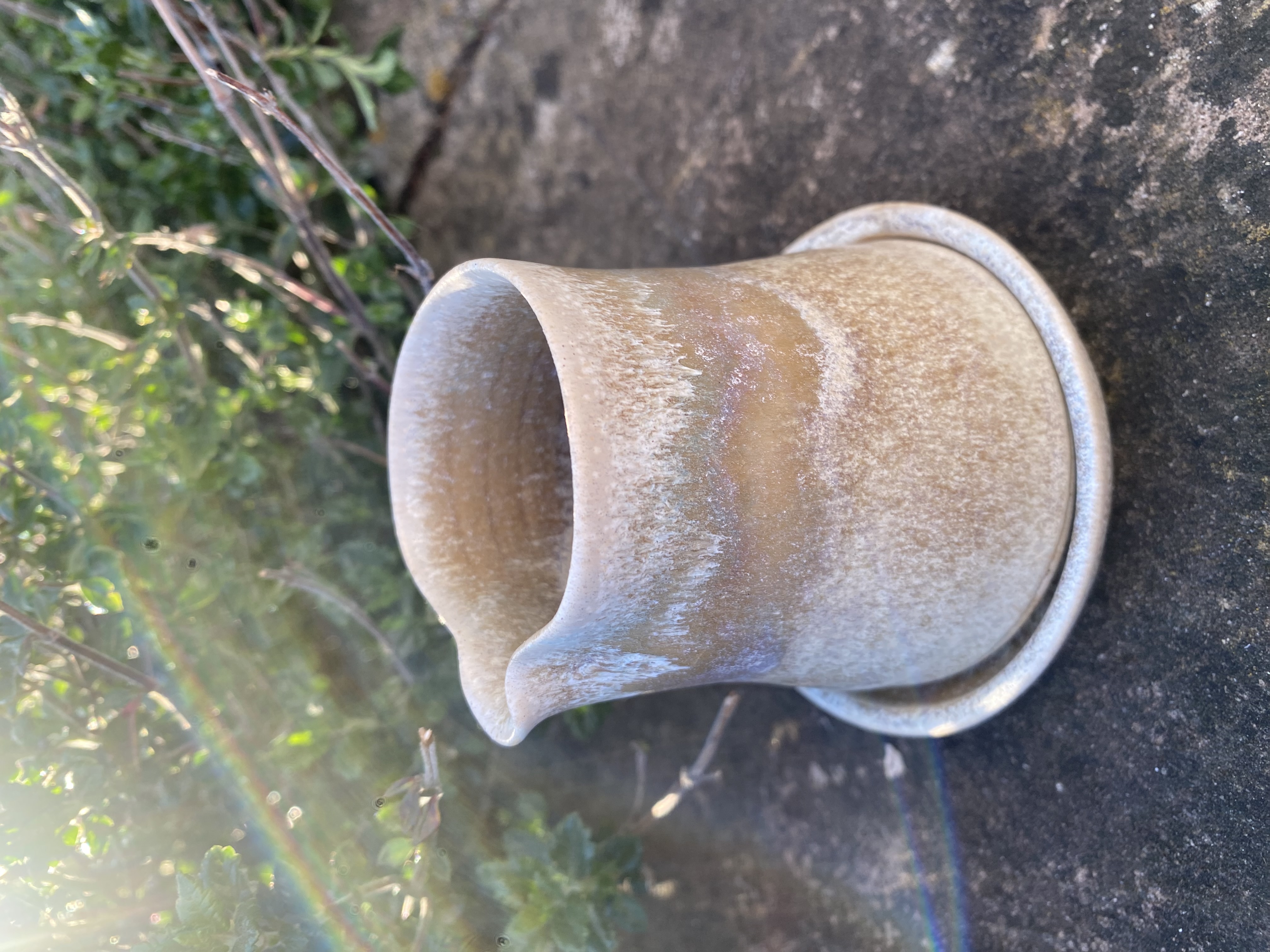 Handmade ceramic jug and saucer