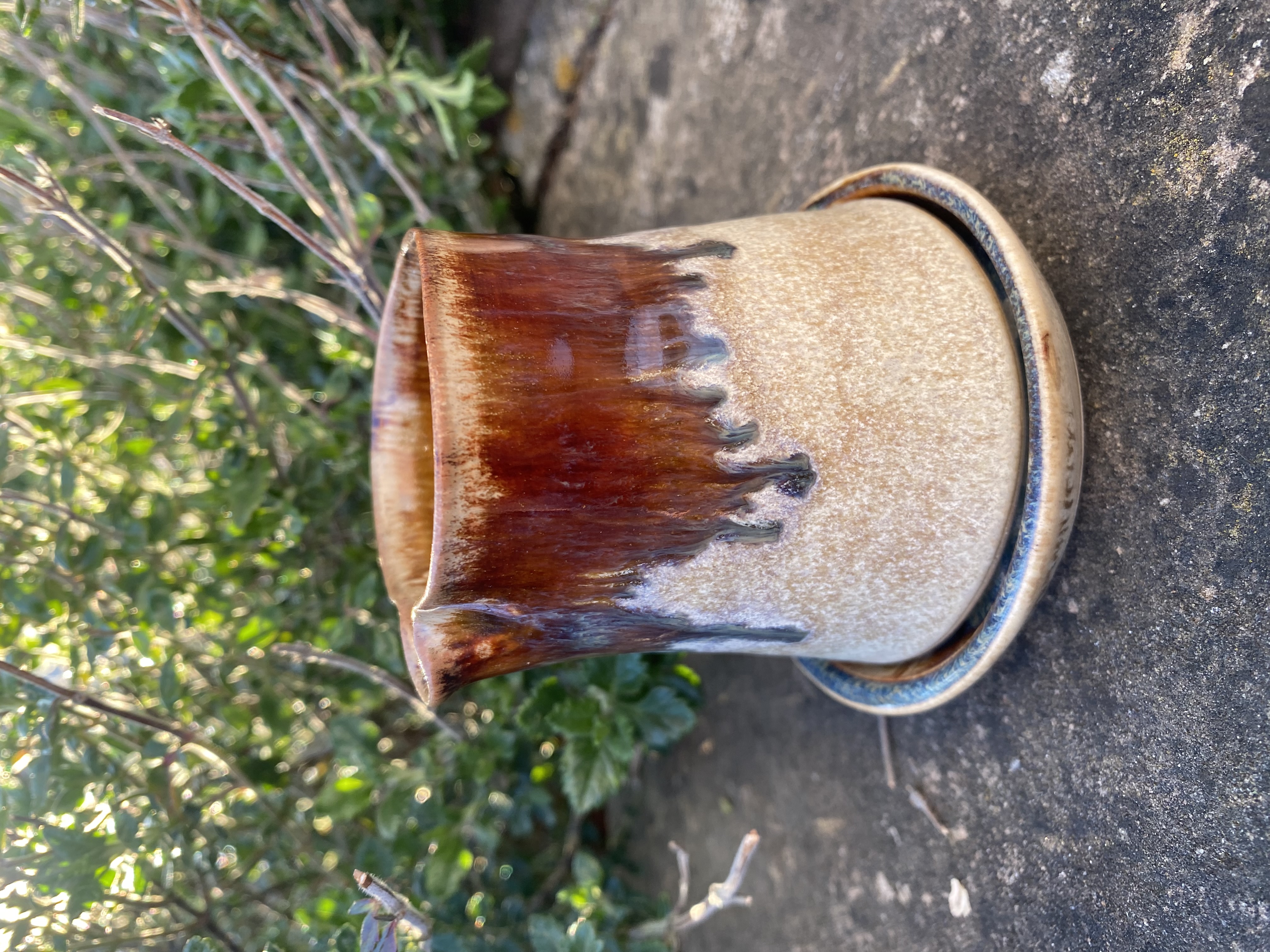Handmade small ceramic stoneware jug with matching saucer