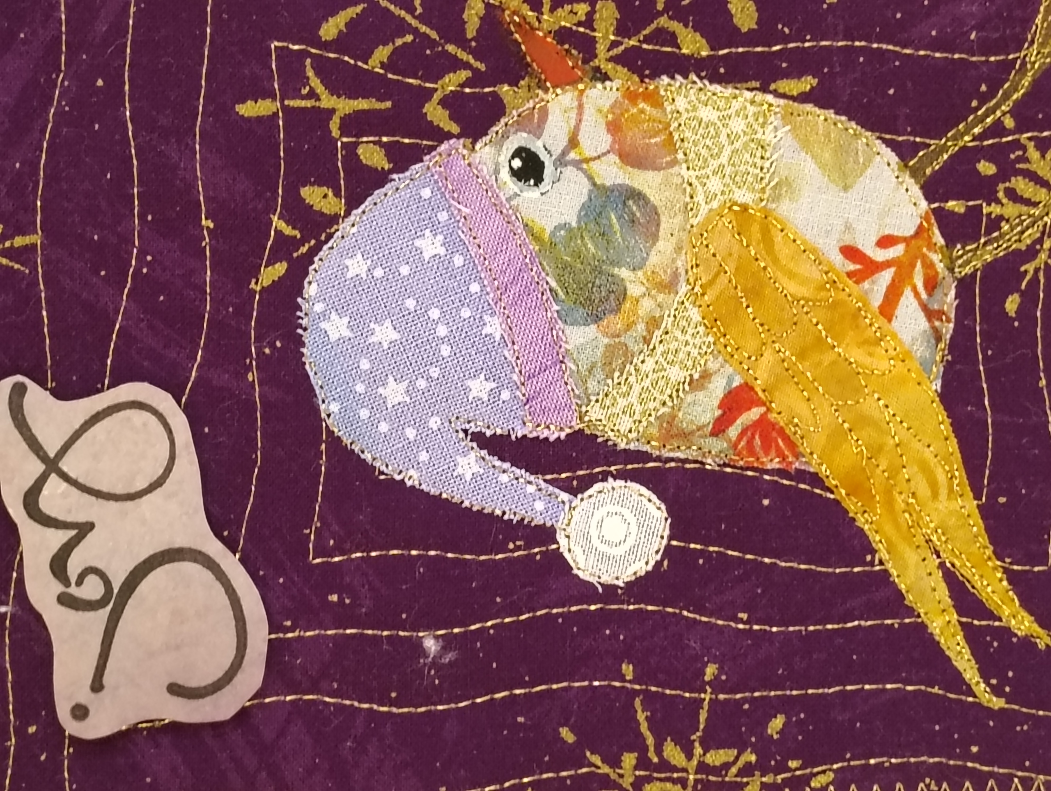 Handmade holiday greeting card with joyful Santa birdie