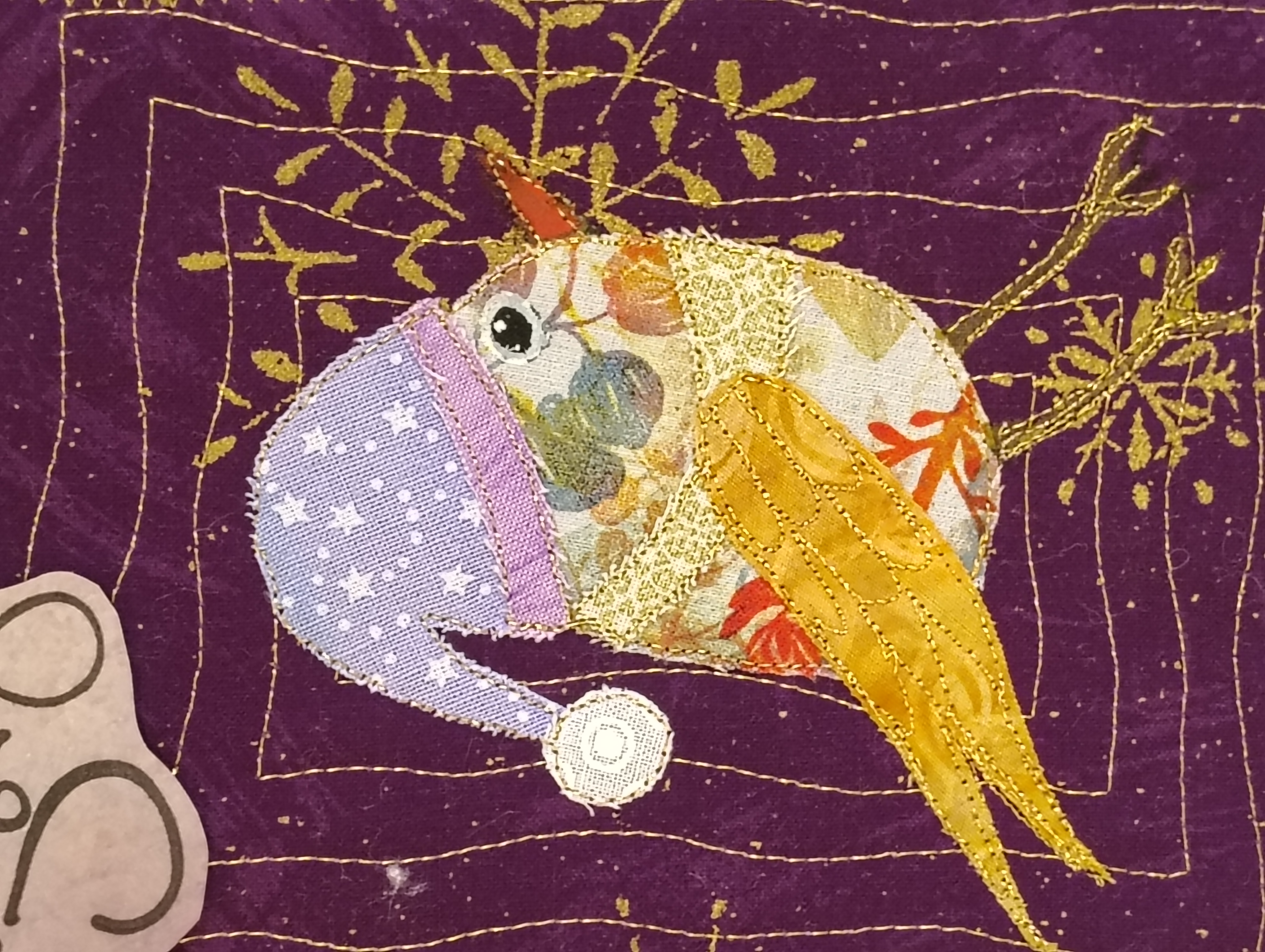 Handmade holiday greeting card with joyful Santa birdie