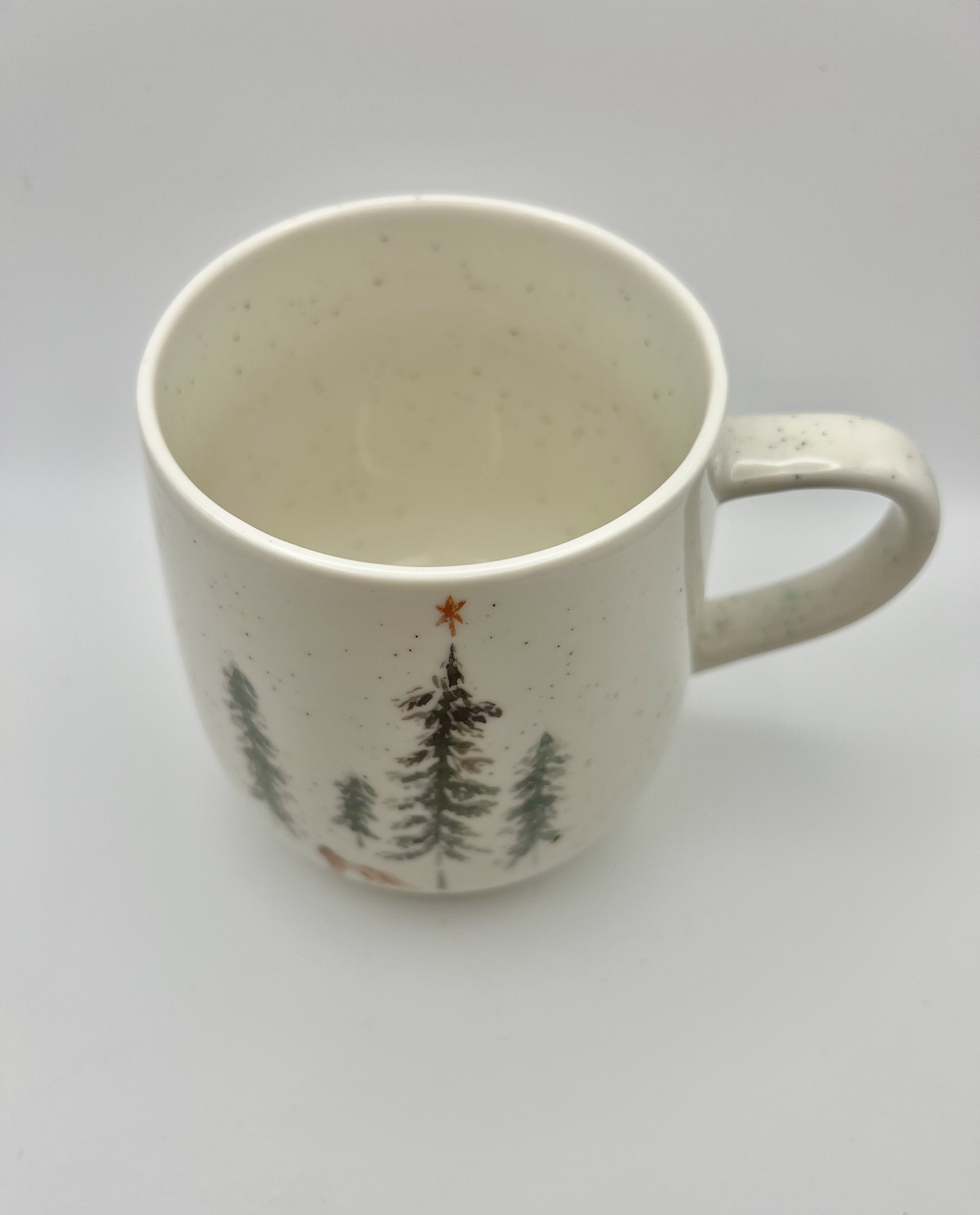 Mug con lupo e abeti