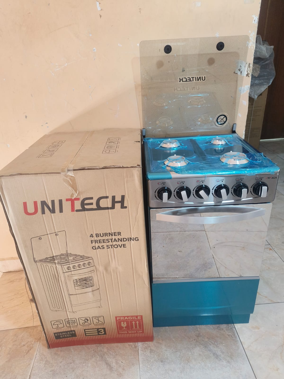 Silver 50*55 Unitech full gas  freestanding JET autoignition cooker.