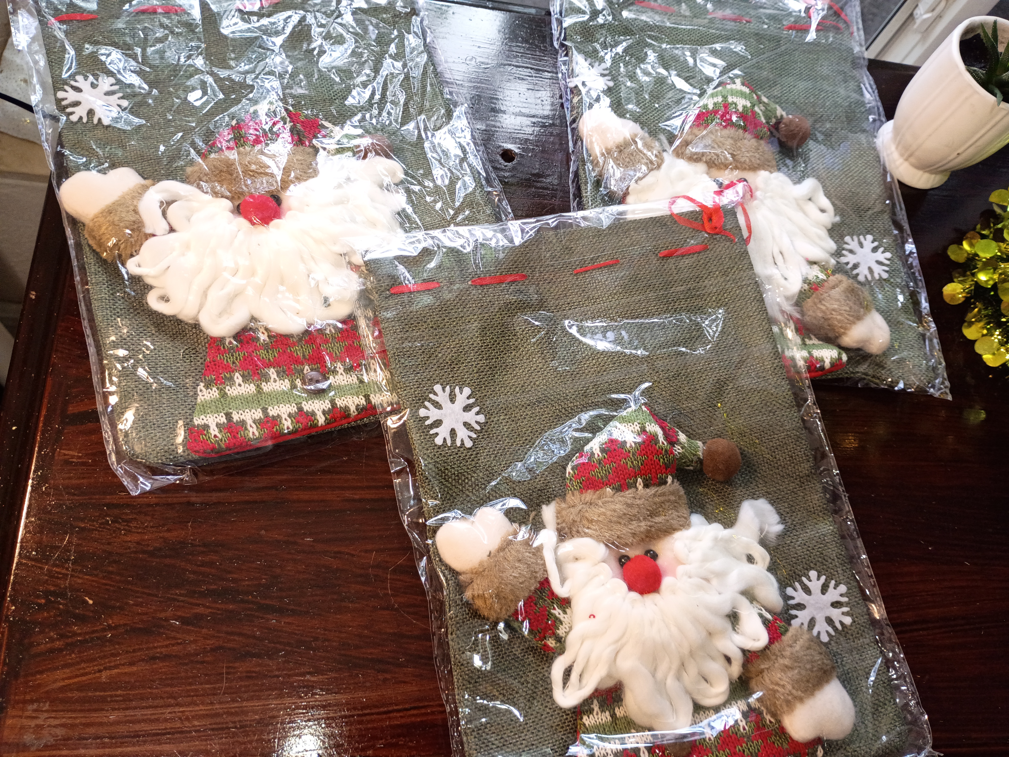 Set of three Christmas gifts bags green