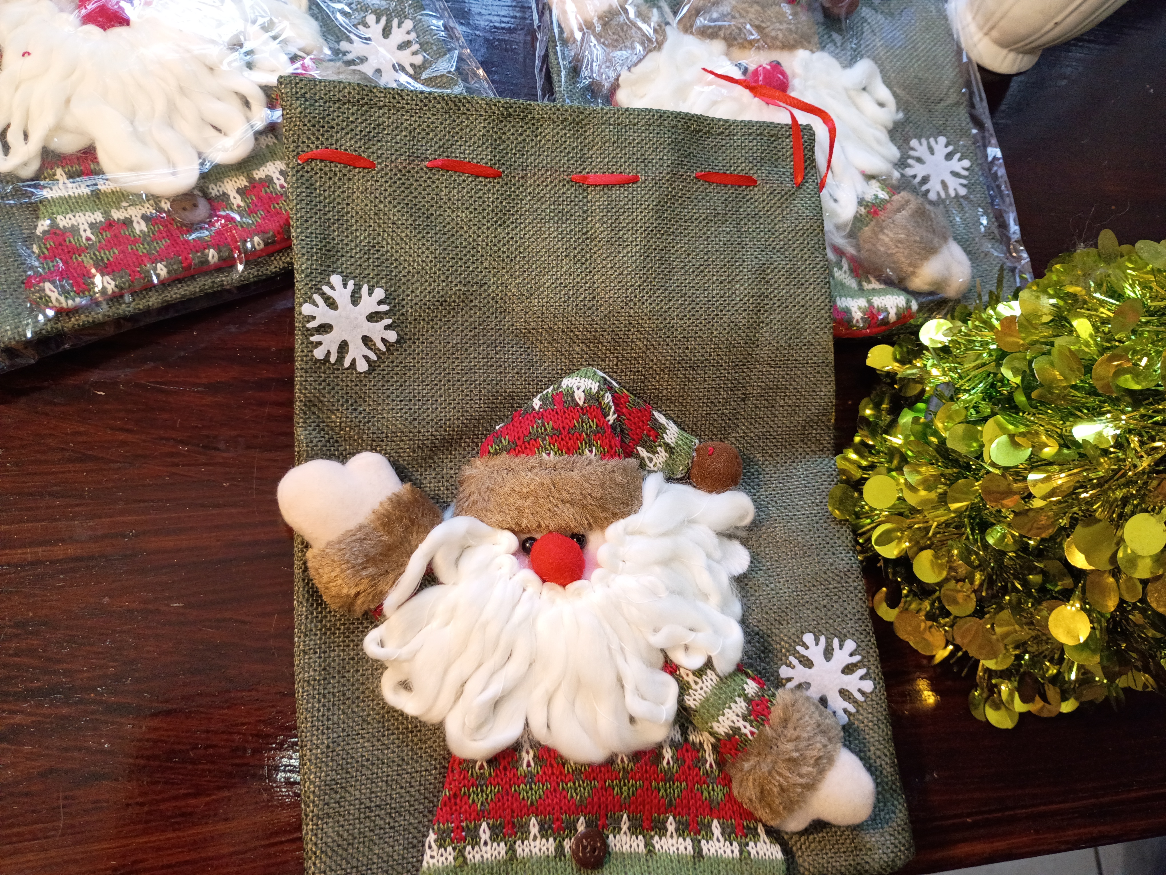 Set of three Christmas gifts bags green