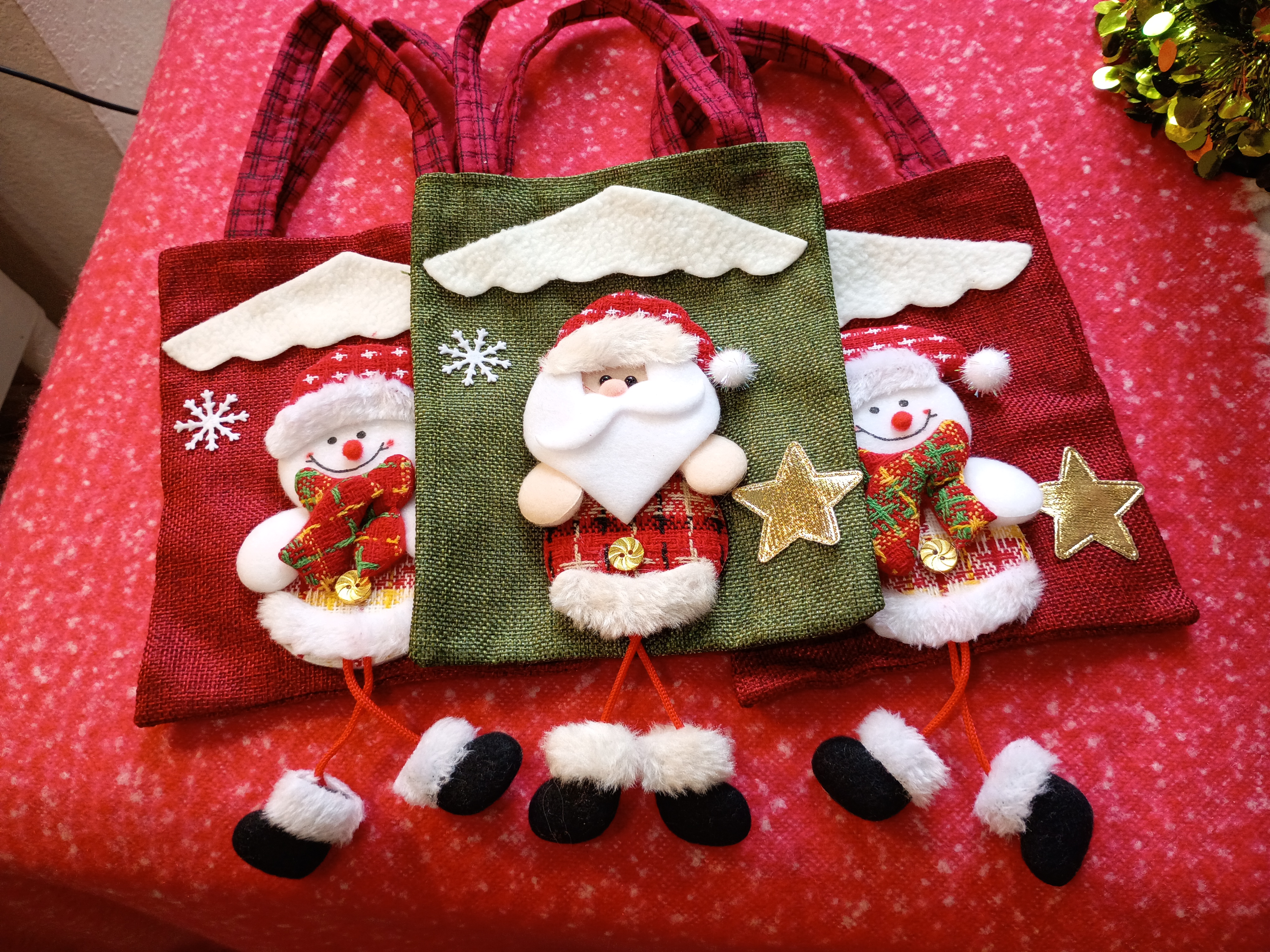 Set of three Christmas gifts bags 