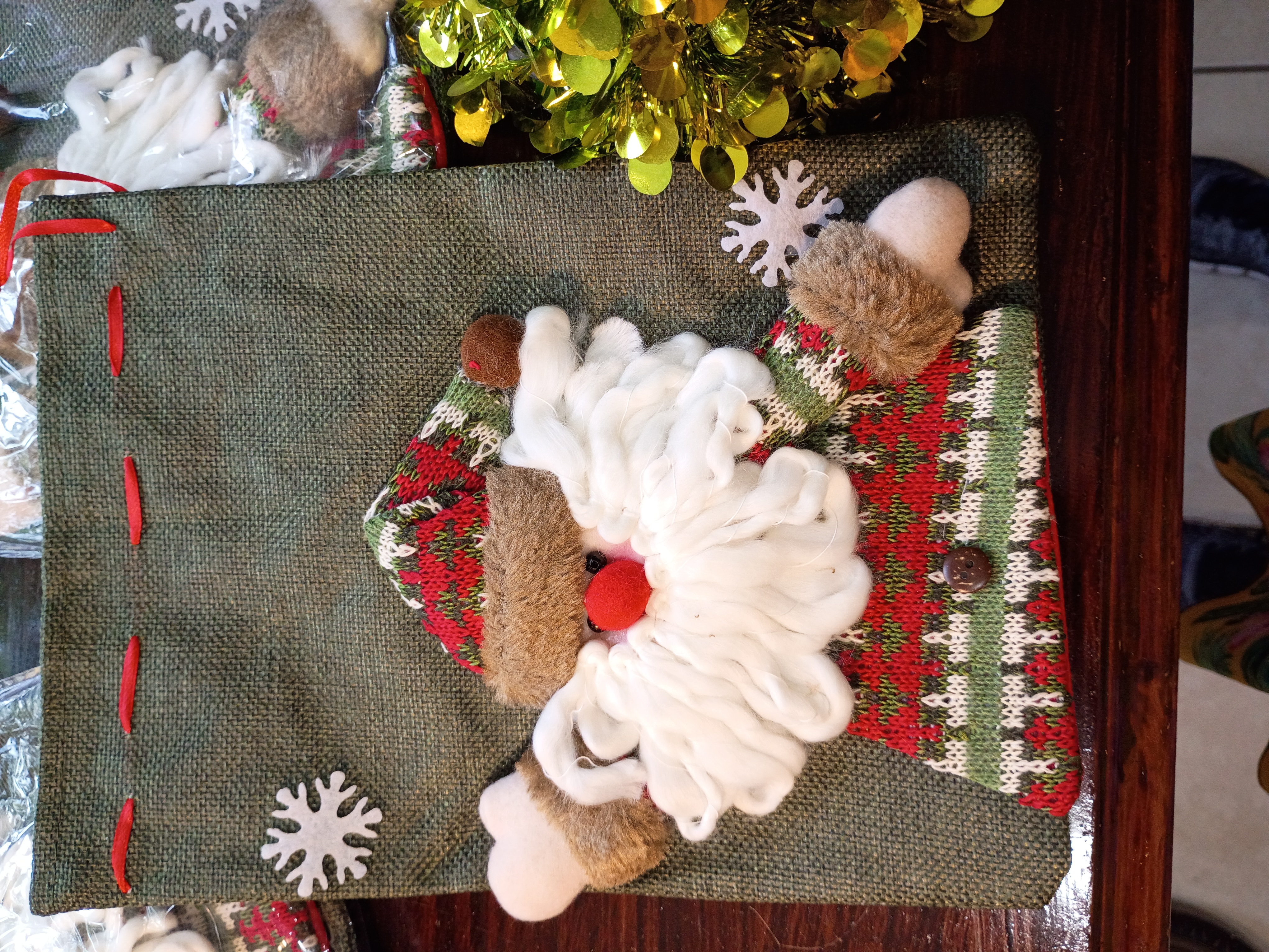 Set of three Christmas gifts bags green