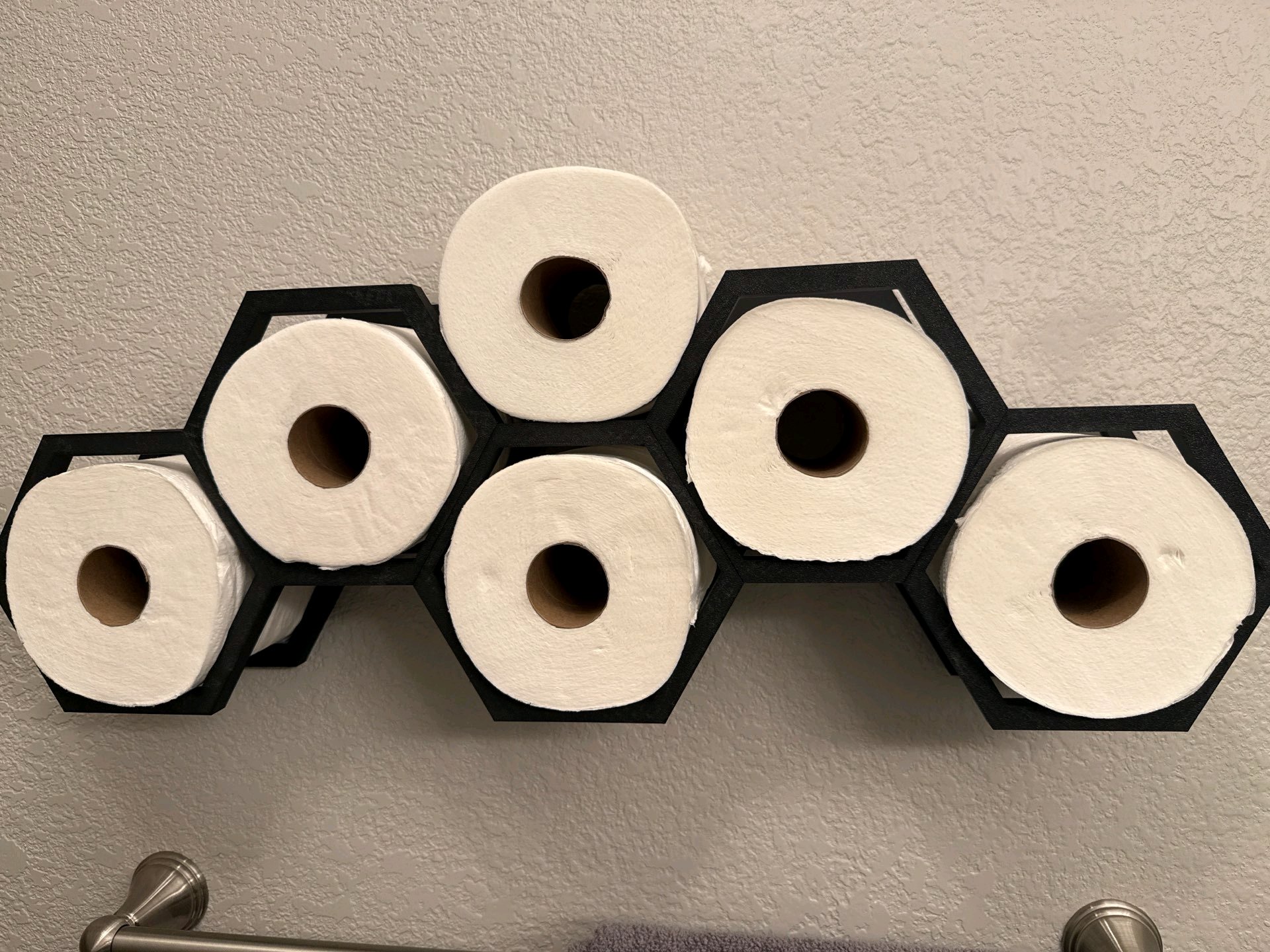 Porta papel higiênico hexagonal