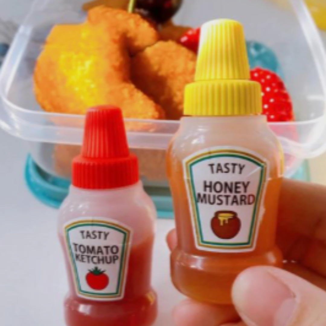 Mini ketchup bottles pair