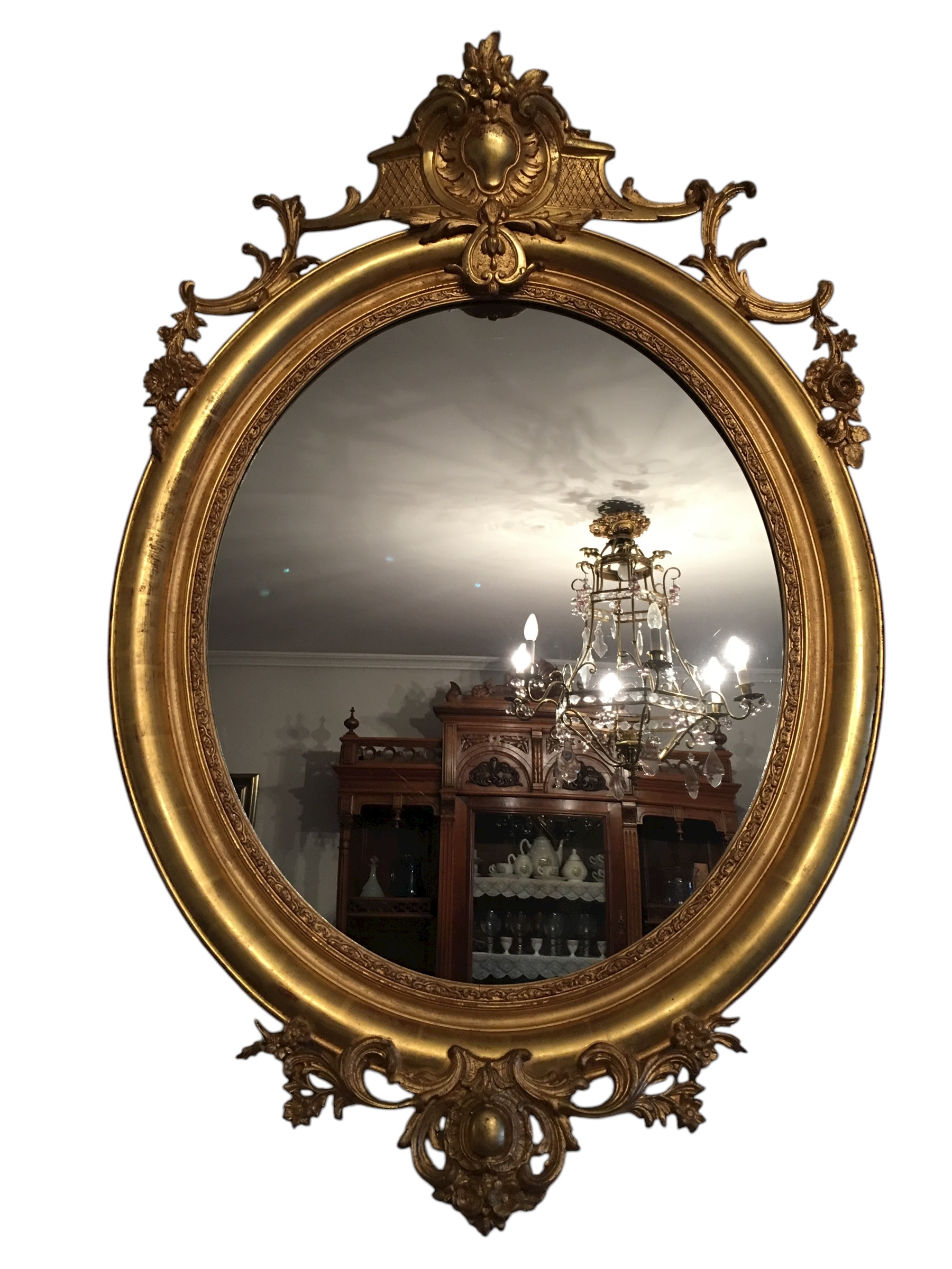 Gran espejo ovalado y dorado al pan de oro, s.XIX.