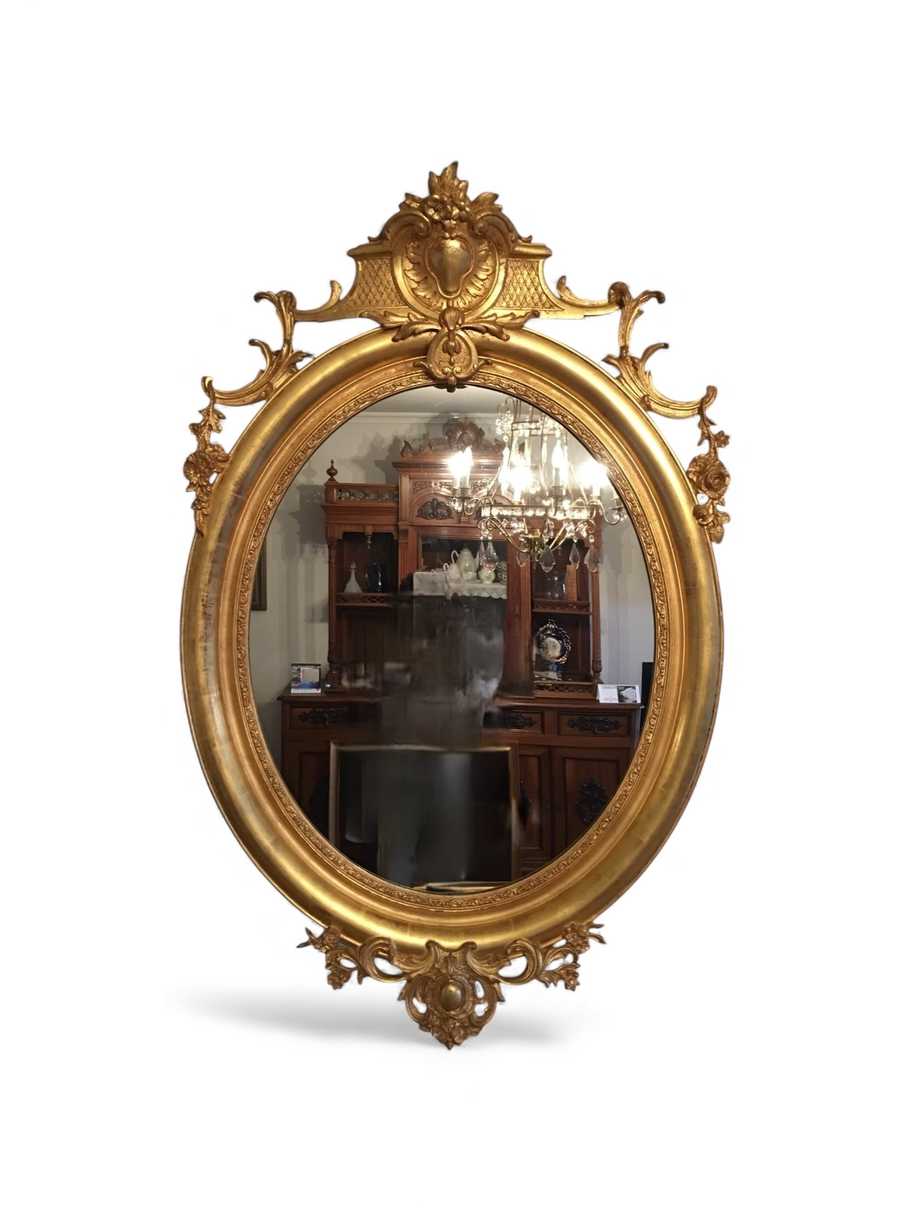 Gran espejo ovalado y dorado al pan de oro, s.XIX.