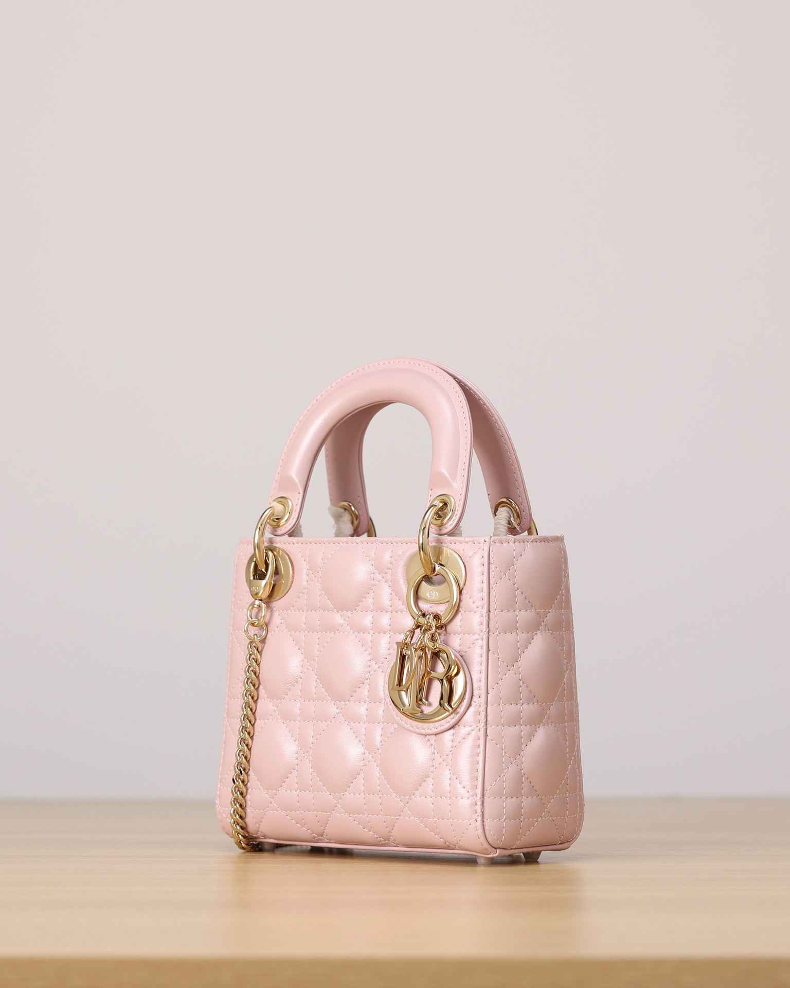 DIOR Lady Dior Three-pocket Duchess bag, pearlized pink sheepskin, gold snap buttons