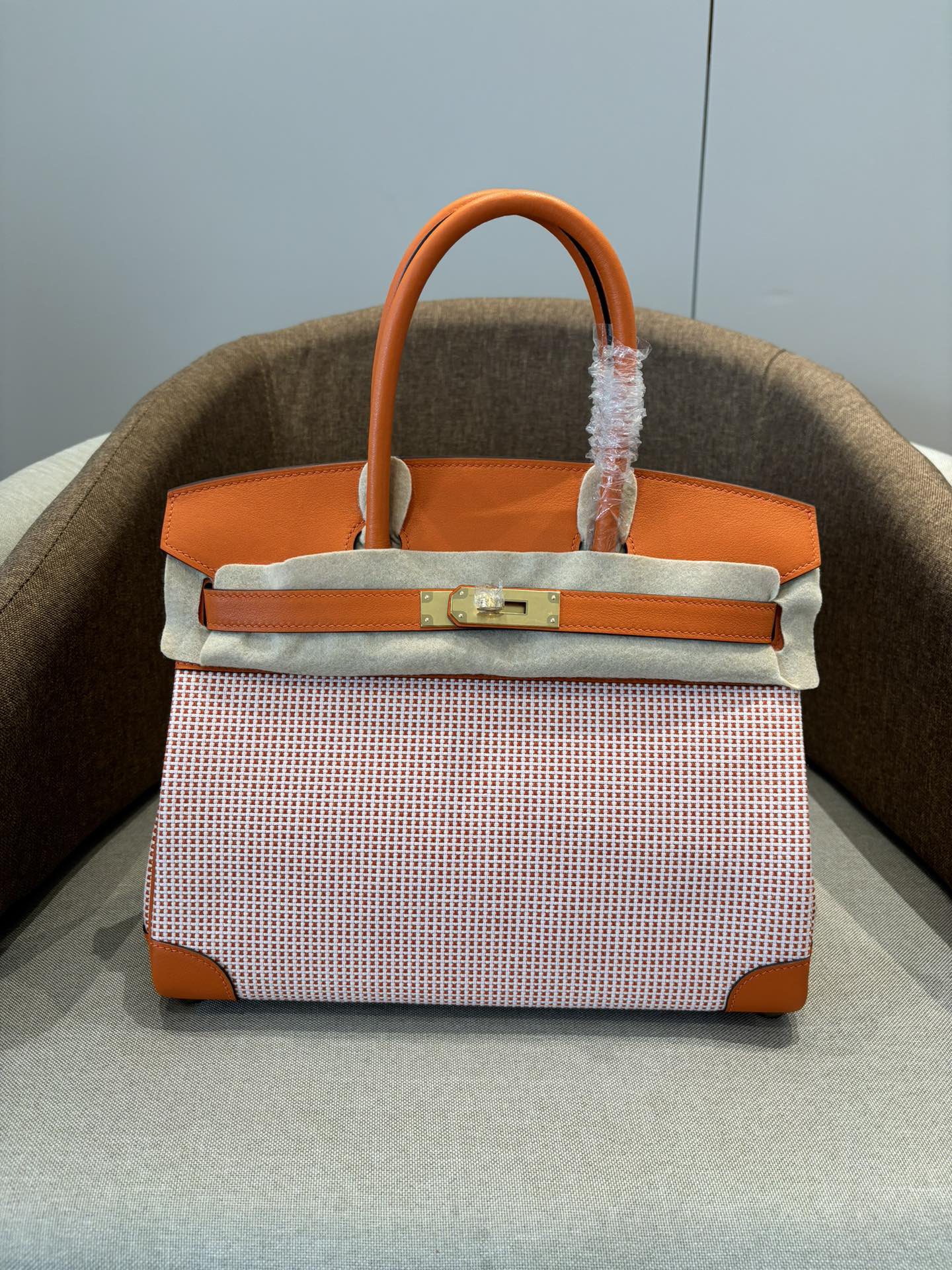 Hermès Birkin 25-30 Orange waffle Gold and silver buttons