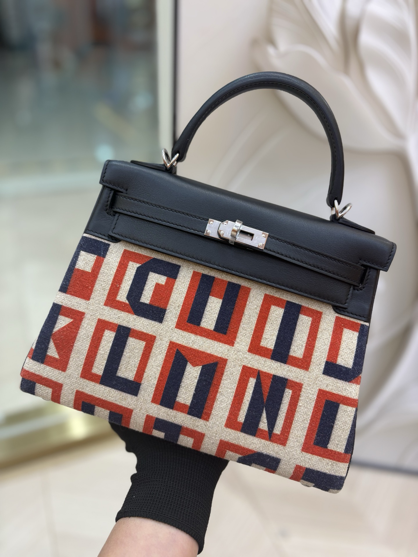 Hermès Kelly 25 Lettered canvas with leather trim in black and silver