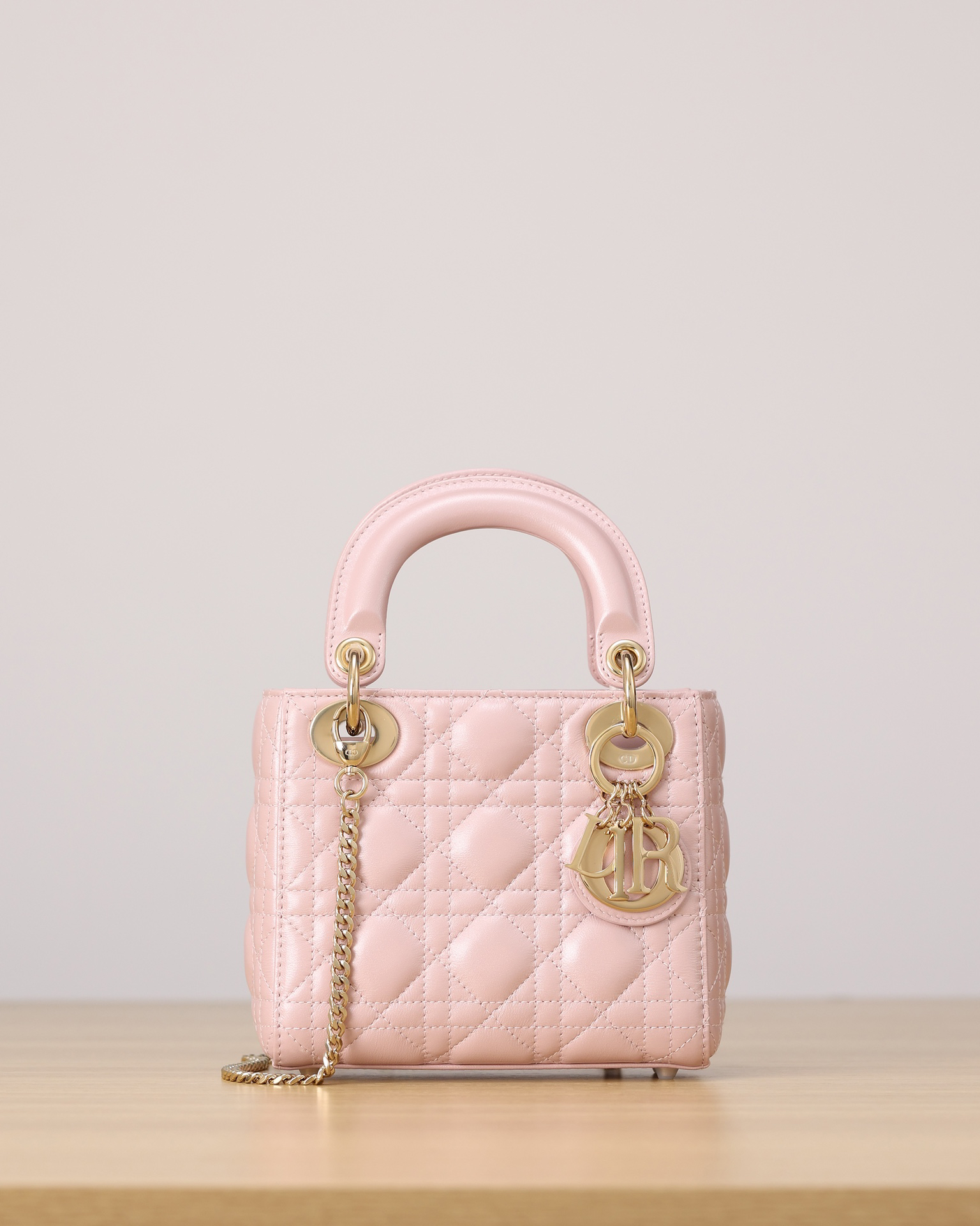 DIOR Lady Dior Three-pocket Duchess bag, pearlized pink sheepskin, gold snap buttons